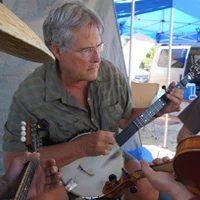 Retired professor Frank Metcalf drives from Vancouver, BC to jam at the Stickerville campground