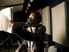 Saquan Smith recording a song at a Spy Hop Open Mic session