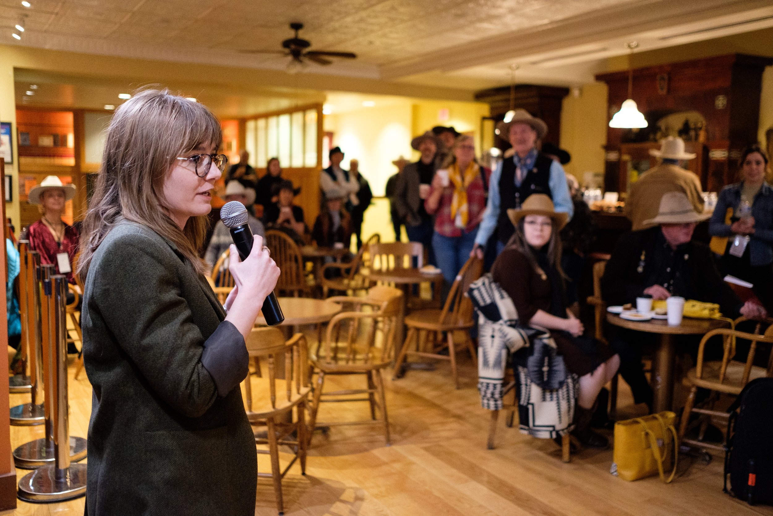 Callie gives a speech at the artist breakfast. Photo by Jessica Brandi Lifland