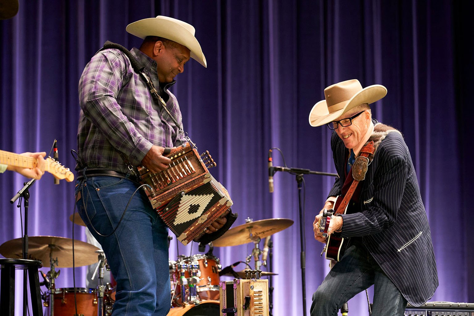 Geno Delafose and Wylie Gustafson trade musical ideas in performance. Photo by Marla Aufmuth