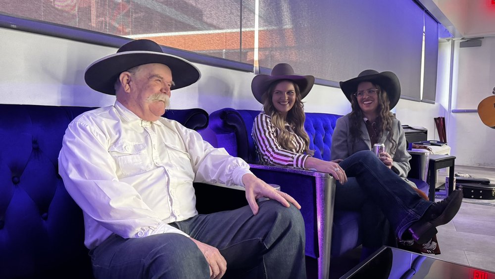Green room smiles with poets Waddie Mitchell and Annie Mackenzie