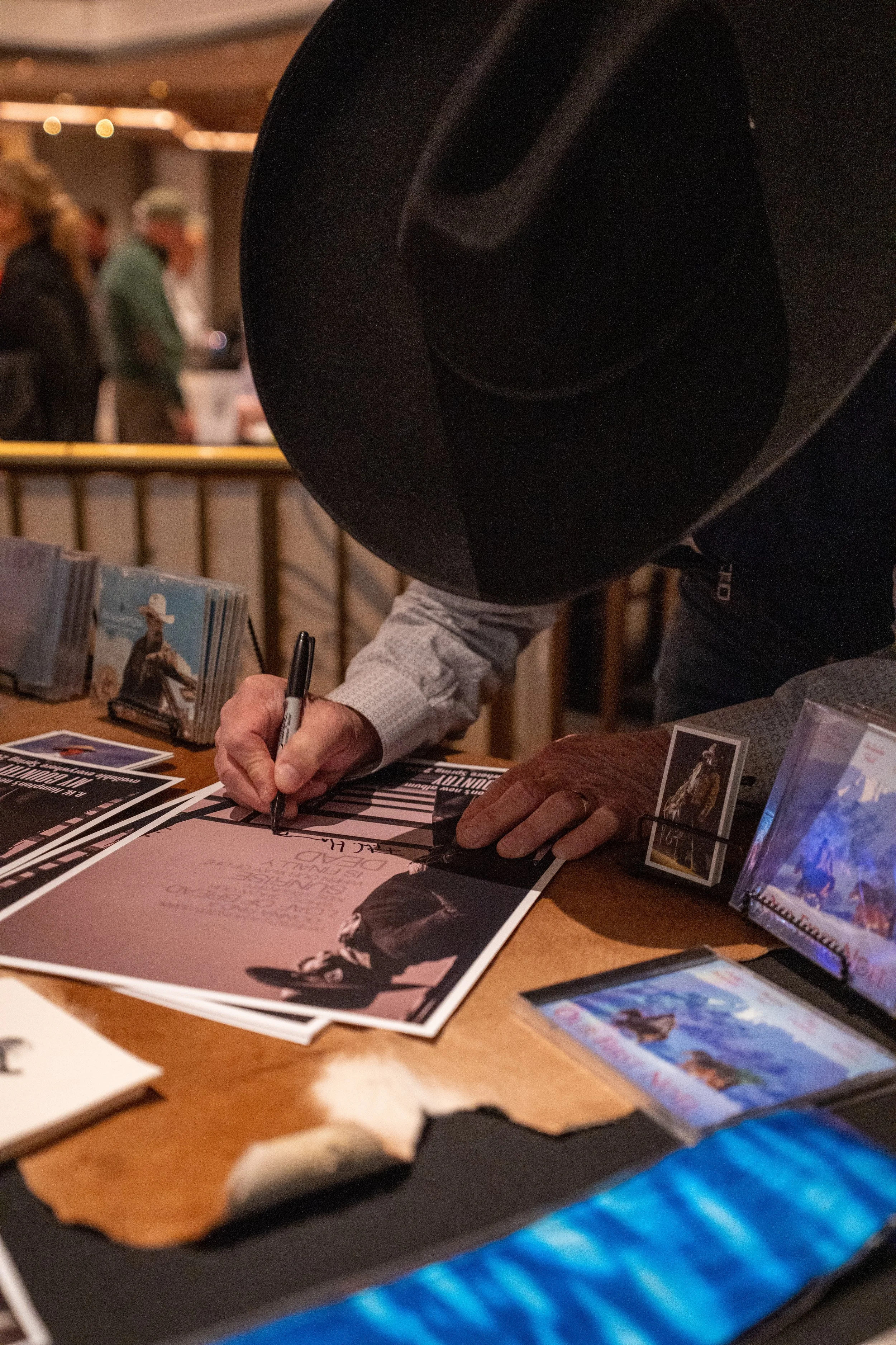 R.W. Hampton signs his merch