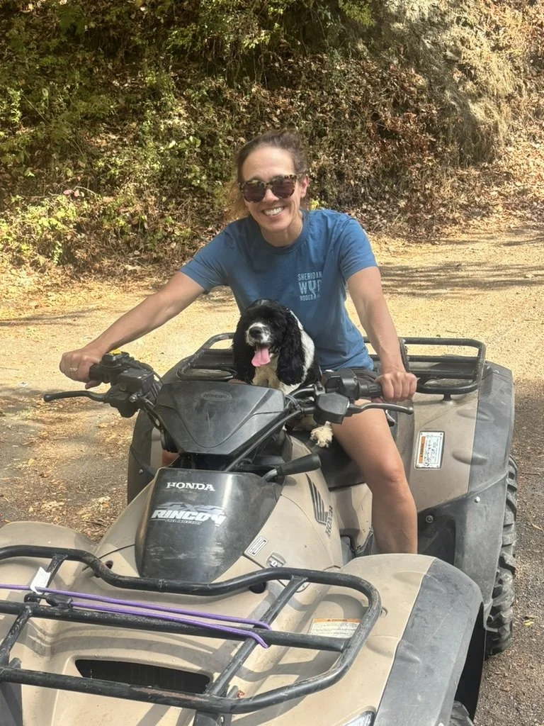 Hattie takes the wheel of the ATV in northern CA. 