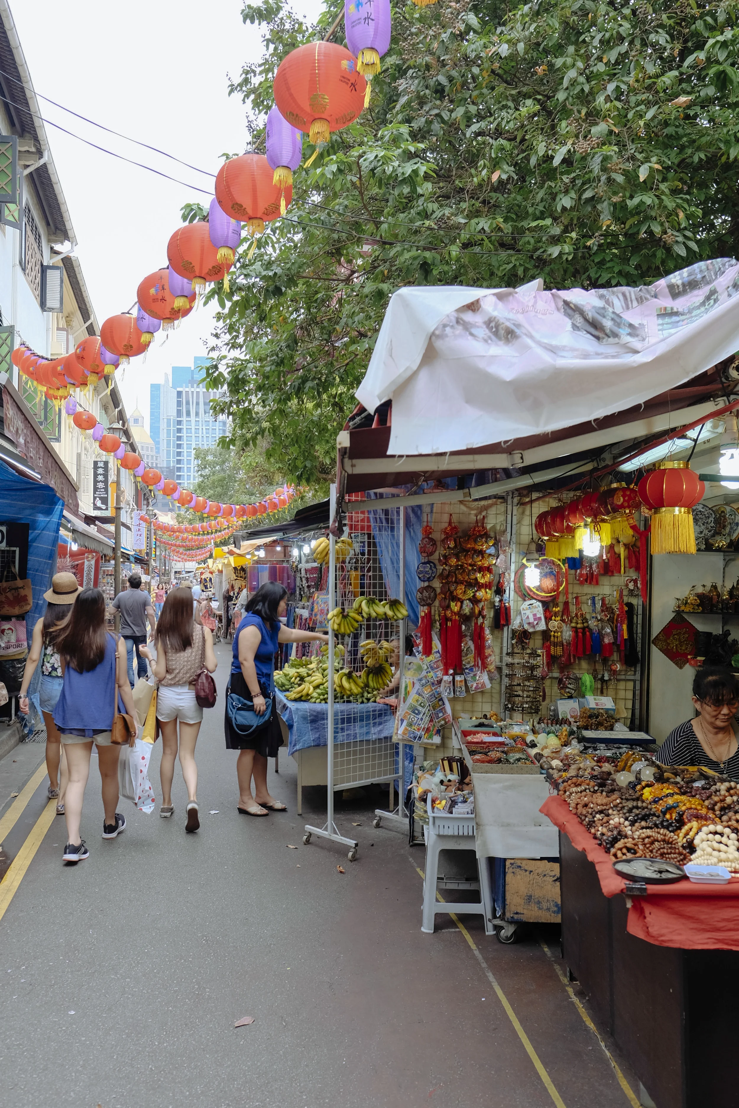 Tourists walk down Trengganu Street