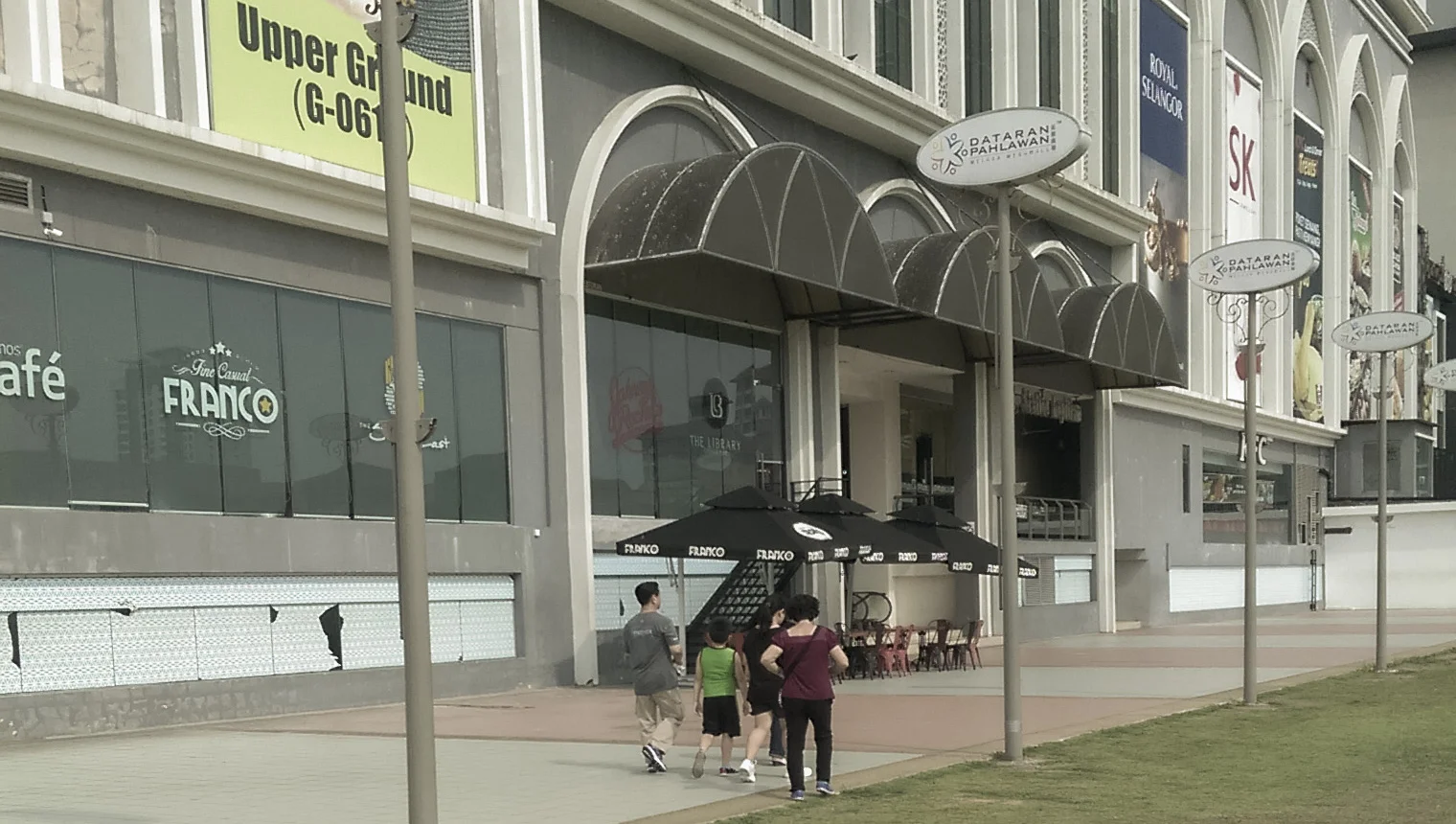 Not far from St Paul's Hill, the family traipses off to pay homage at one of Melaka's many malls