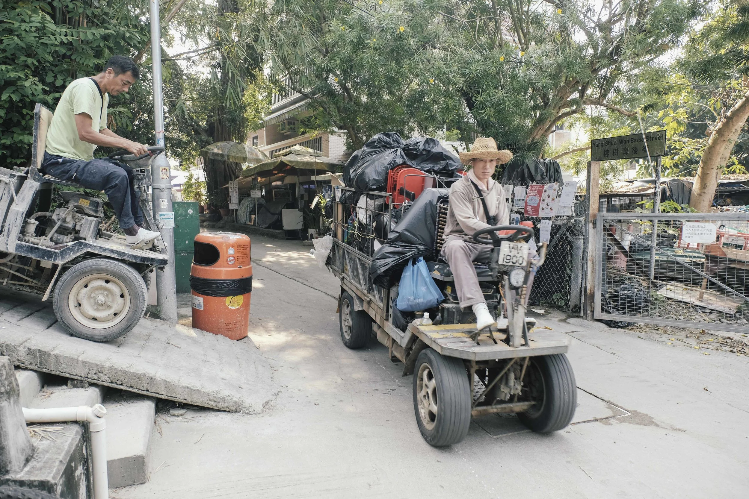 These tiny tractors used to haul building materials and trash are the only form of motorised transport allowed. 
