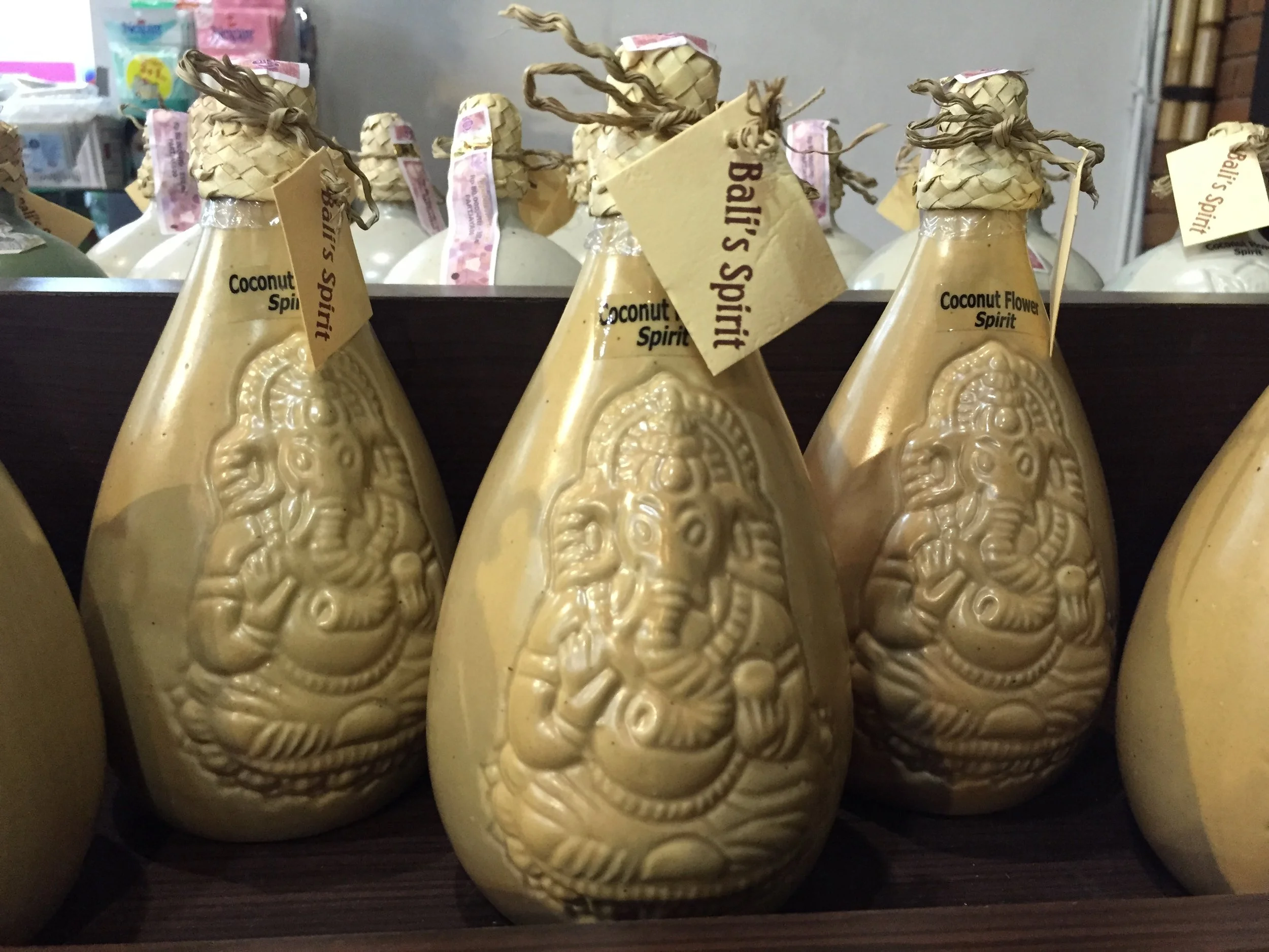 <IMG_2130.JPG> Inscribed on the bottle is the image of Ganesha, a Hindu god, with a label that reads “Bali’s Spirit”.
