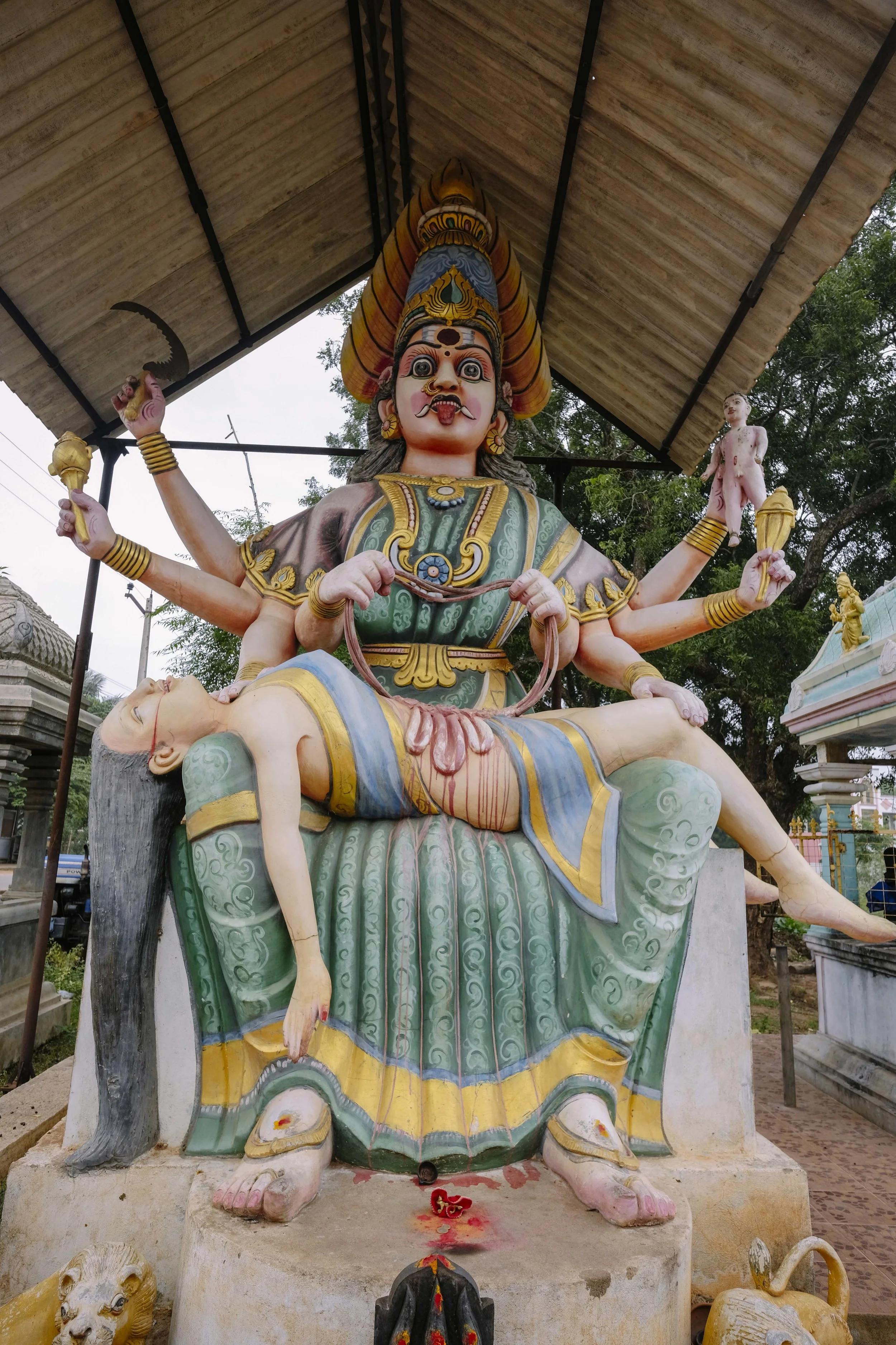 The goddess Kali can never be lodged in a glass cell, and she will have her due. This is a temple on the outskirts of Auroville. 