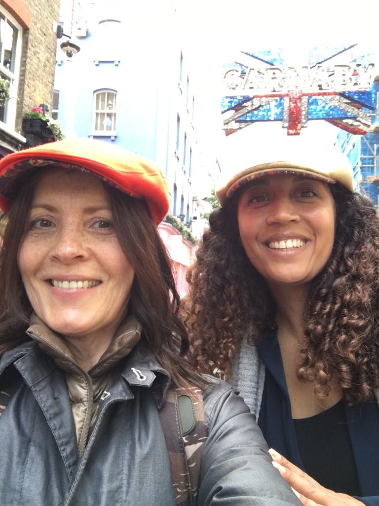 Rhian and Janine outside Libertys in Carnaby Street in our bespoke vintage liberty print caps