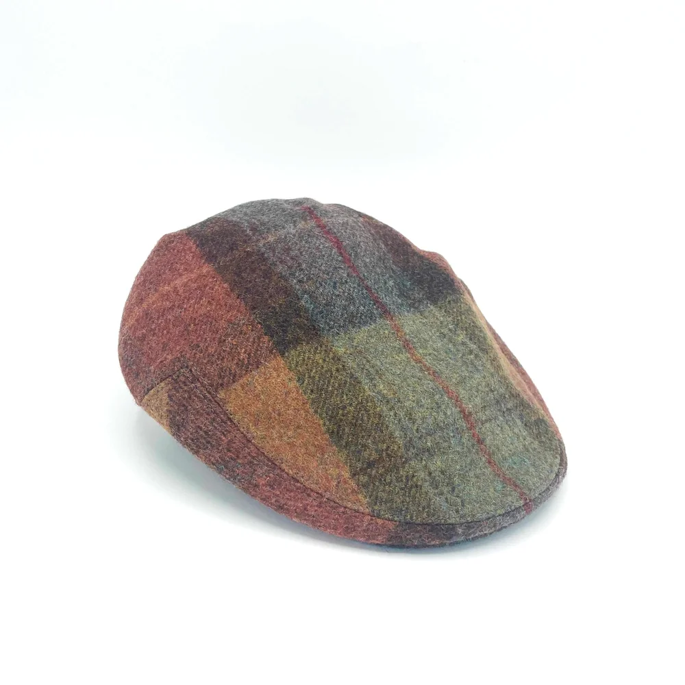 Orange Skye Flat Cap — KEMPADOO MILLAR HEADWEAR