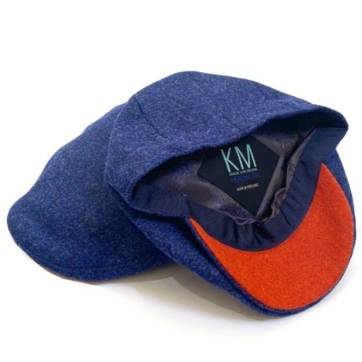 blue orange pure wool Abraham Moon tweed ethical headwear British flat cap Yorkshire made headwear KM Kempadoo Millar hat mens hats cool style natural female owned brand independent