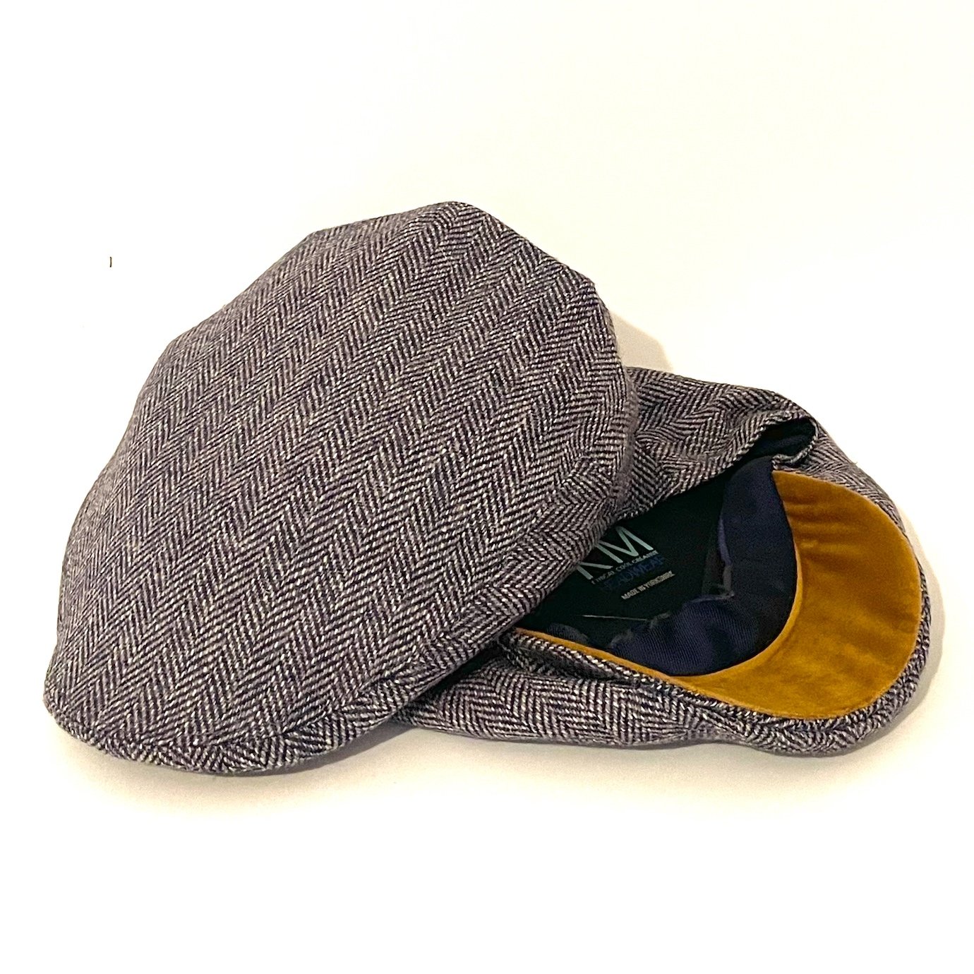 blue planet eco-herringbone ethical flat cap hat headwear kempadoo Millar km tweed sustainable manufacture British Yorkshire mens hats women's hats flat cap ivy cap navy pure wool luxury