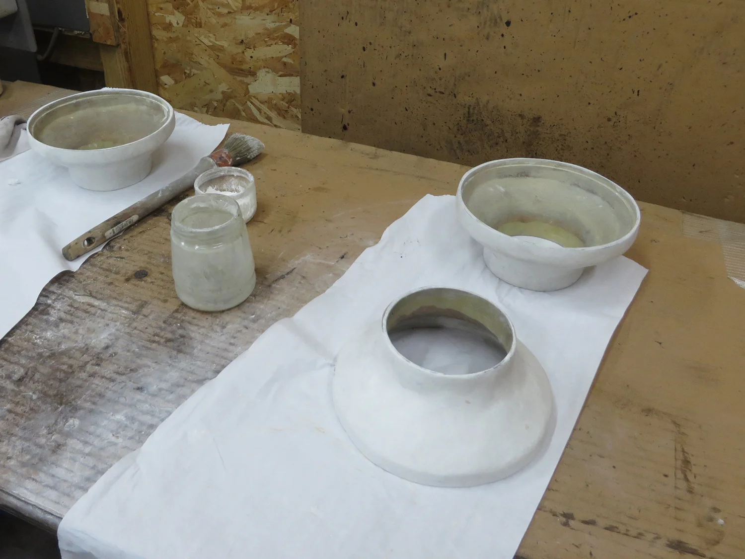 Aura sconce in white bronze during process.