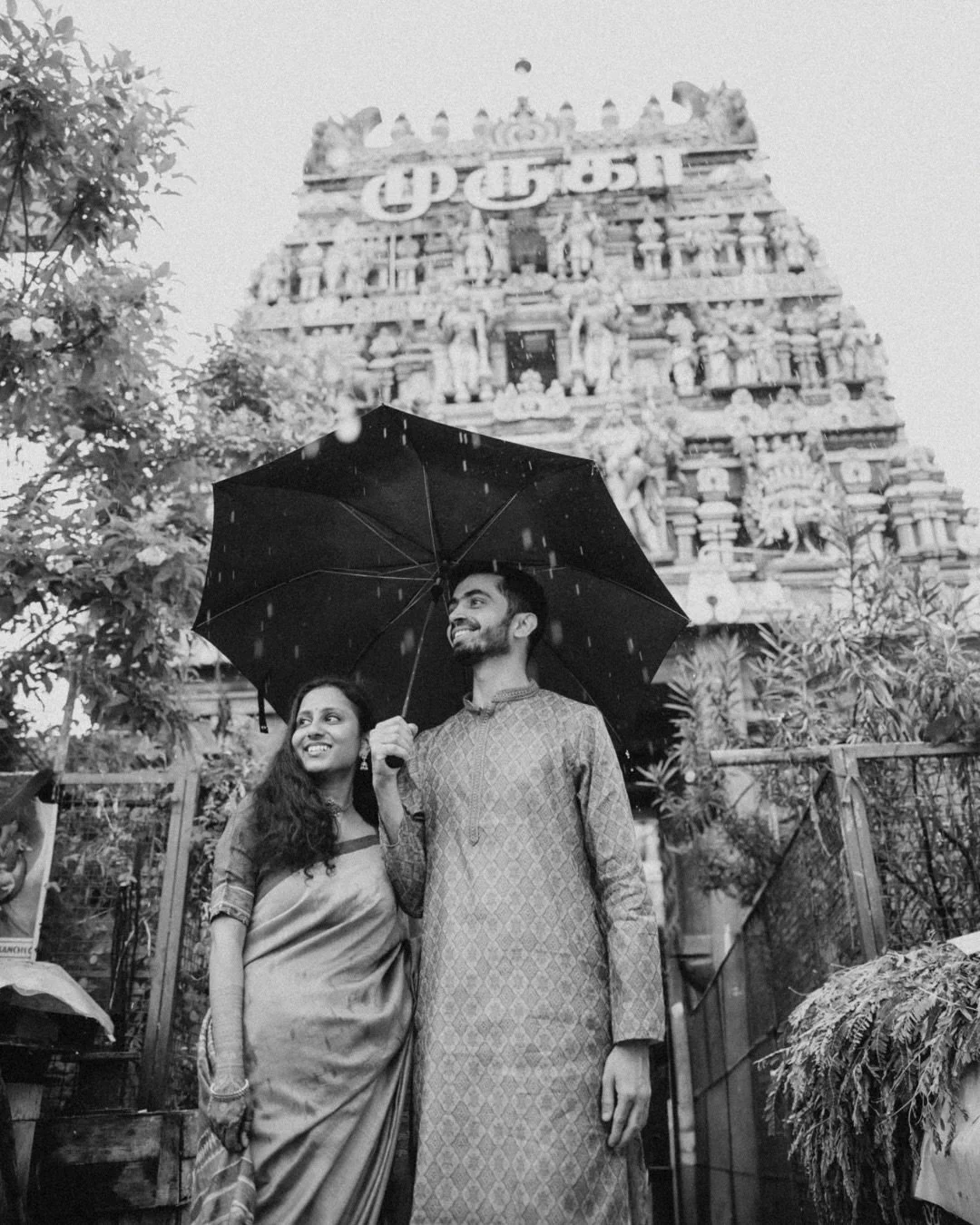 When tradition meets serendipity

Captured amidst the ancient grace of Kapaleeshwarar Temple in Mylapore, the rain surprised us &mdash; but love made it magical. From colorful temple towers to glistening wet streets, every moment felt like a timeless