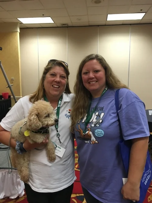As part of our sponsorship we had the chance to pick a prize to auction off. We chose everyone’s favorite - an Amazon gift card! Here’s Kelly with the winner (rocking a Sparkie polo)