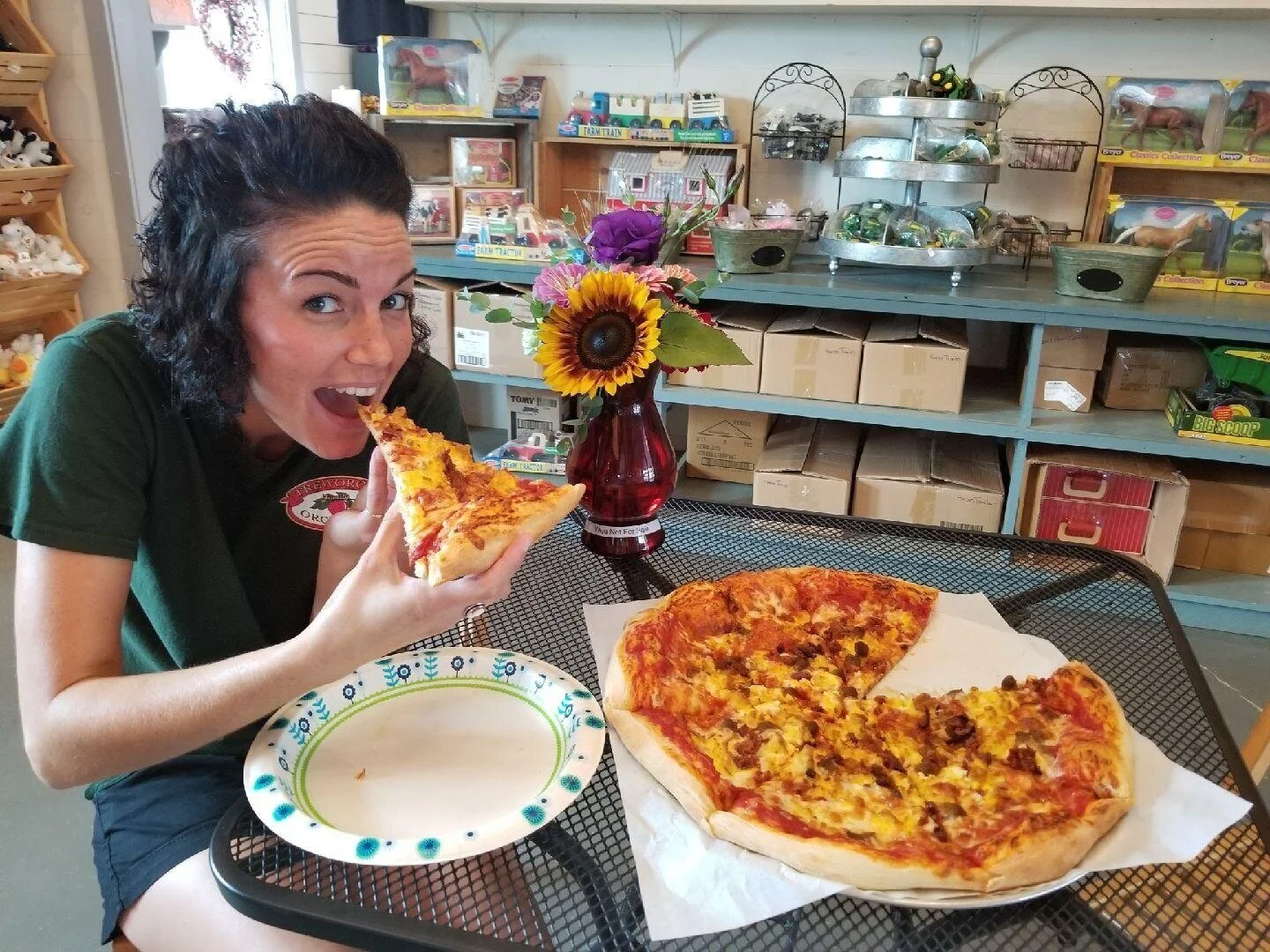 Cafe worker eating pizza.jpg
