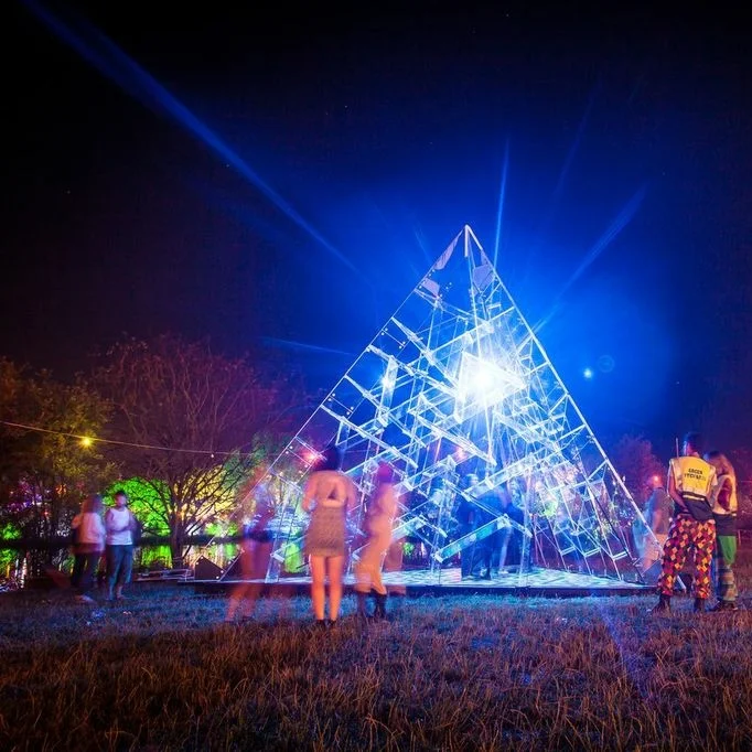 'Luz' Art Installation for Secret Garden Party 2014. First debuting at SGP this co-funded piece went on to Burning Man festival in Nevada. Inside was a touch sensitive floor and the structure was made from tesselating perspex blocks. by Les Mechants Curation and site specific logistical support, by Secret Arts / studioTAC Photography by Nick Caro