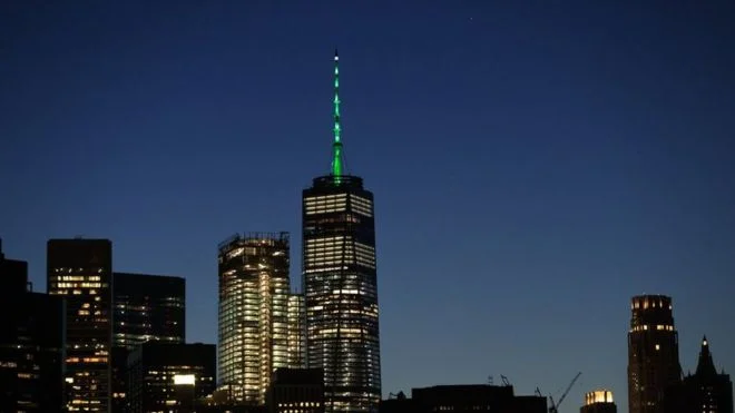 A green glow on the outside of US buildings usually means it's St Patrick's Day. But on Thursday night, green stood not for Irish heritage, but for the environment.