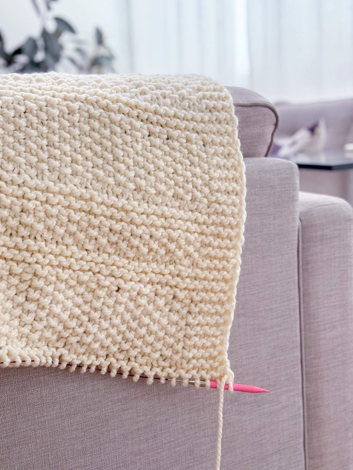 Working up the final rows of my #SeedlingBlanket design that I&rsquo;m working on. 

Launching April 17 (as a kit with @lionbrandyarn as well 🥰)

Comment &ldquo;NEWSLETTER&rdquo; to get a coupon when it comes out 💜
.
.
.
.
#knitatudeknits #homedeco
