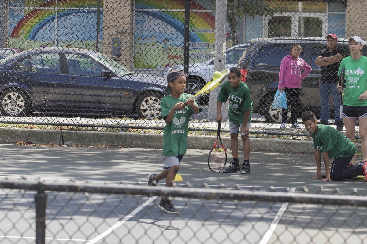Members of the Kings County Tennis League hone their skills in Brooklyn on the corner of Marcy and Nostrand Aves. (ALEX RUD/FOR NEW YORK DAILY NEWS)