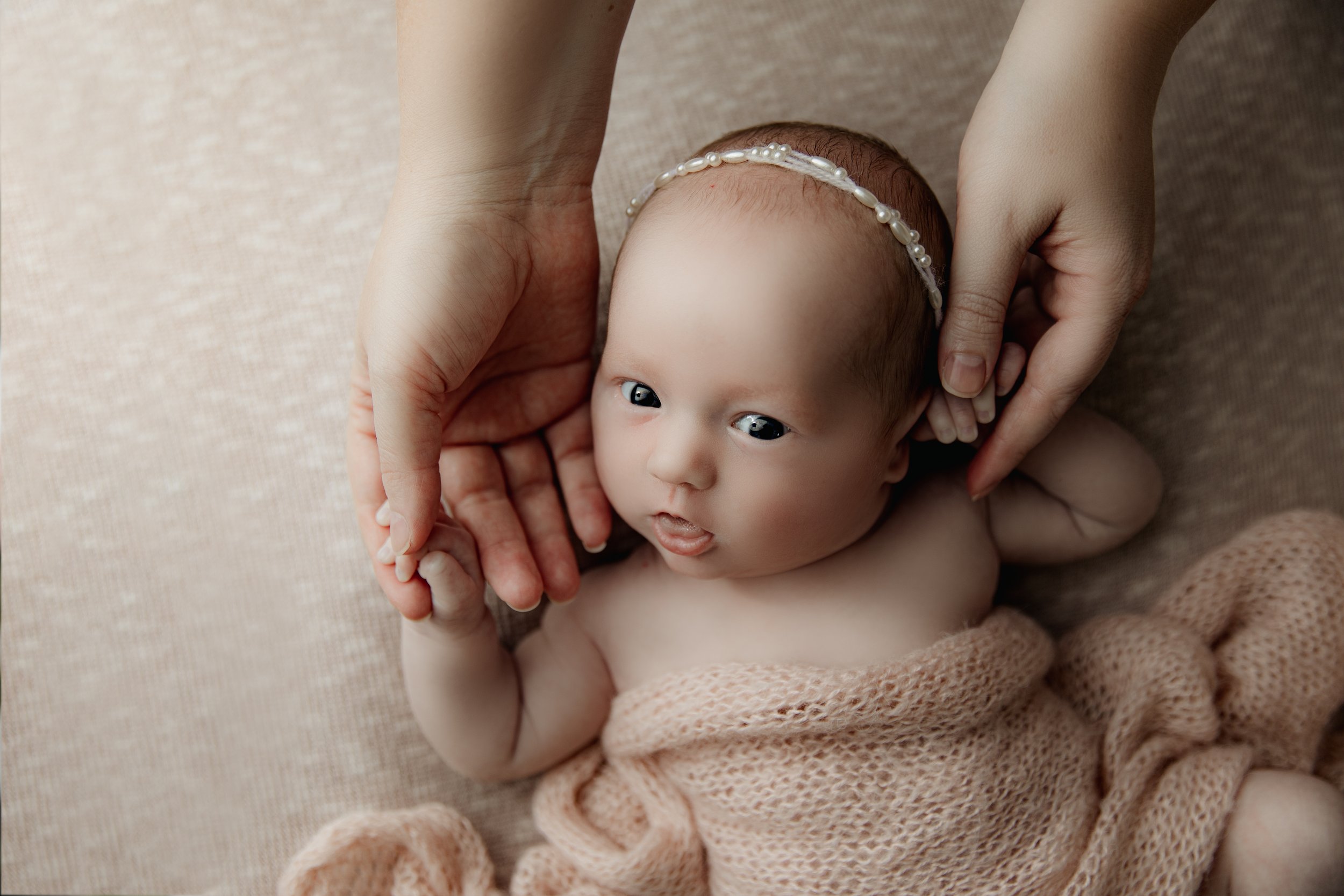 newborn_girl_holds_moms_hands_photography.jpg.jpg