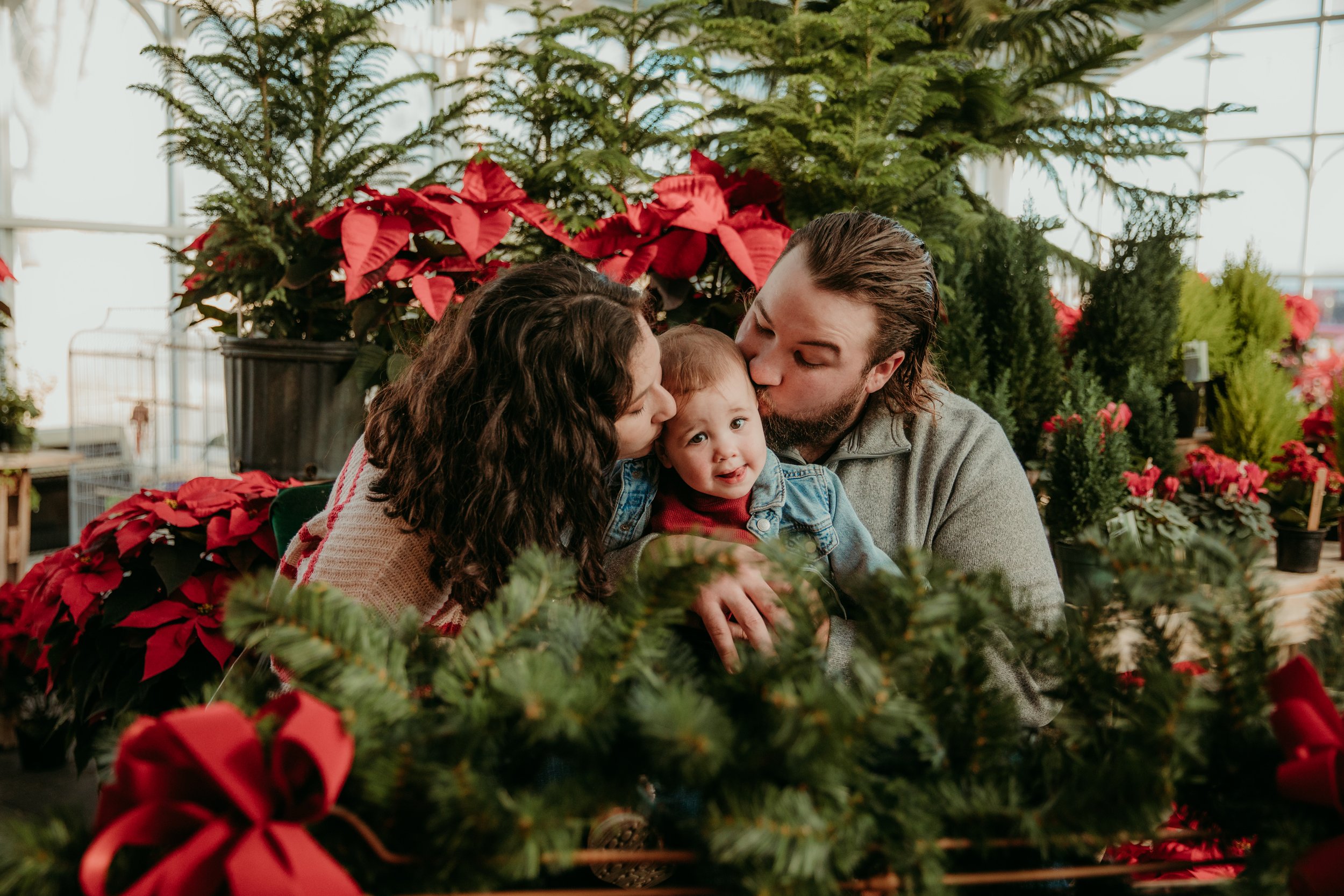 mom_and_dad_kiss_toddler_karfre_flowers_sycamore.jpg.jpg