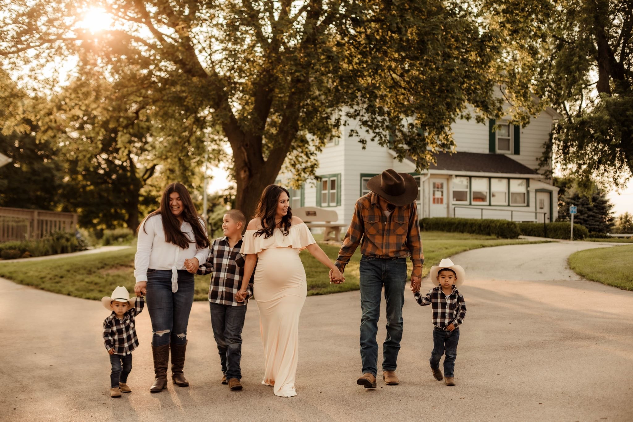 family_walks_together_sycamore_historical_maternity_session.jpg