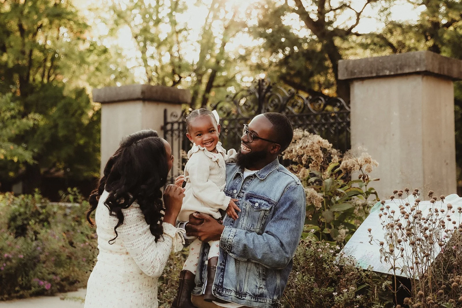 parents_tickle_toddler_daughter_family_session