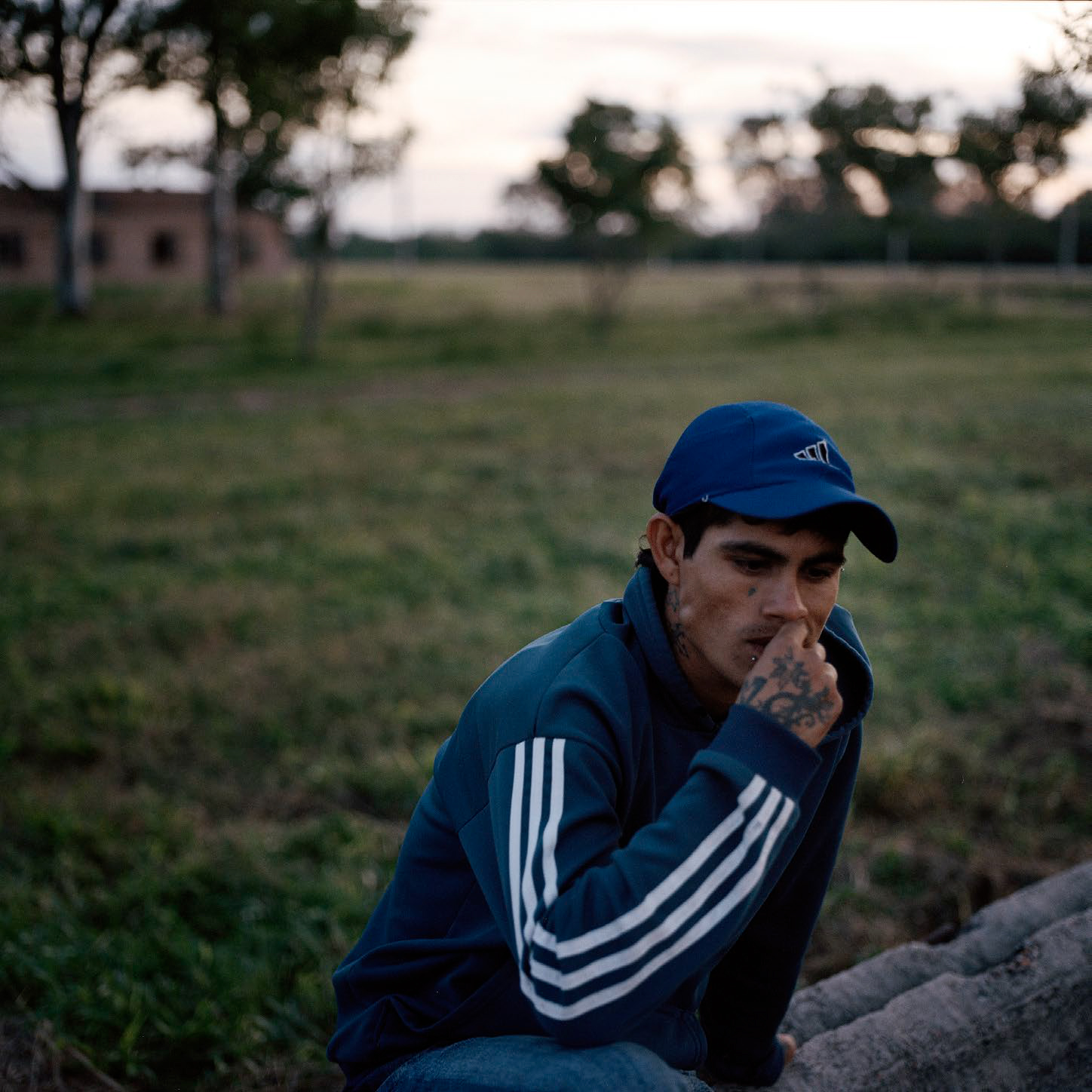 Maximiliano Fernandez, 21, near his girlfriend’s house in Aviá Teraí where he lives with her family. There are few job opportunities in Aviá Teraí but Maximiliano works every now and then in the wood and charcoal industry in more remote areas, and is considering going to Buenos Aires to work, where his brother lives