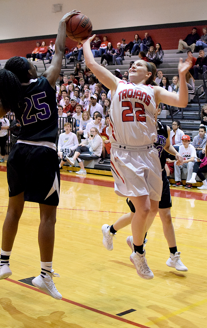 BRYCE MERENESS/Citizen photo Park Hill South freshman Alecia Westbrook, left, battles for a loose ball with Park Hill’s Alex Berger during a Suburban Conference Blue Division game Friday, Feb. 12 at Park Hill High School in Kansas City, Mo.