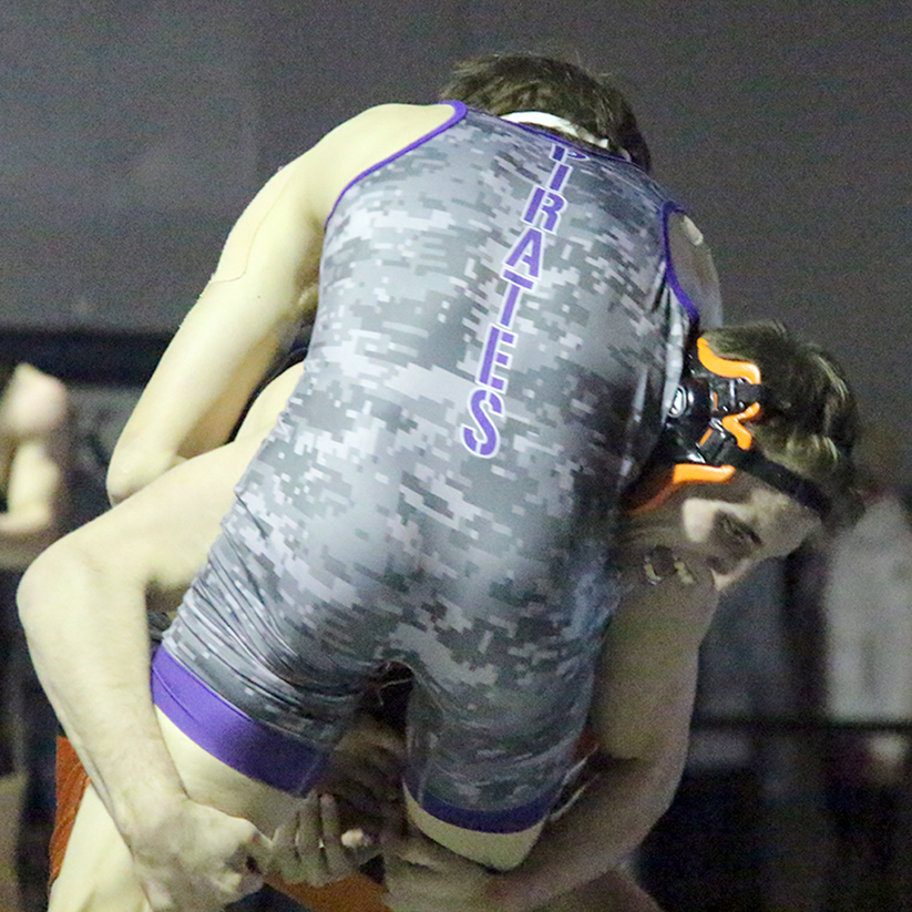 ROSS MARTIN/Citizen photo Platte County senior Johnny Blankenship, rear, takes down Belton’s Jacob Benson during the 160-pound title bout.