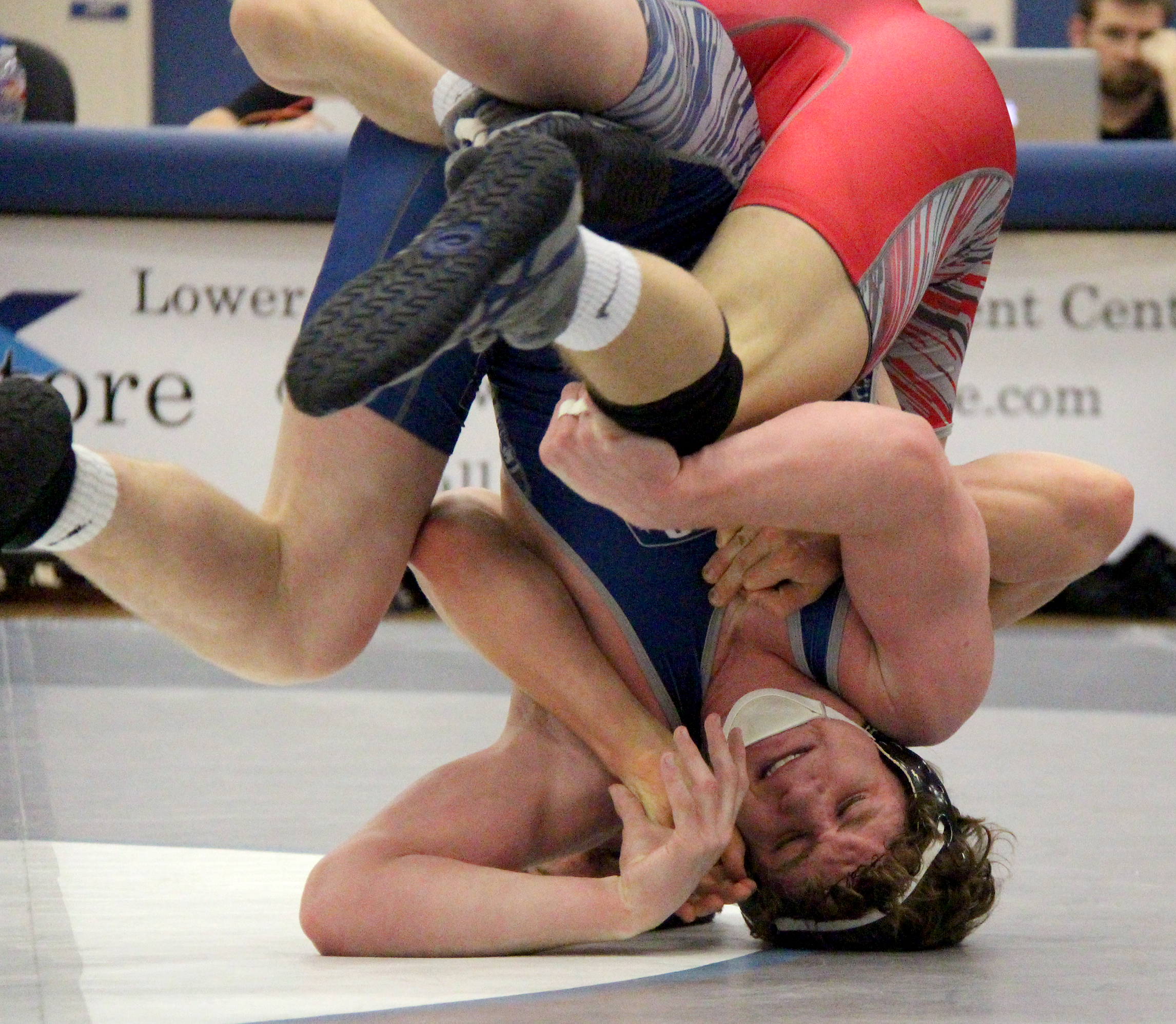 ROSS MARTIN/Citizen photo Park Hill senior Sean Hosford, front, rolls through during a 145-pound matchup with Tyler Hensley of St. James Academy on Tuesday, March 8.