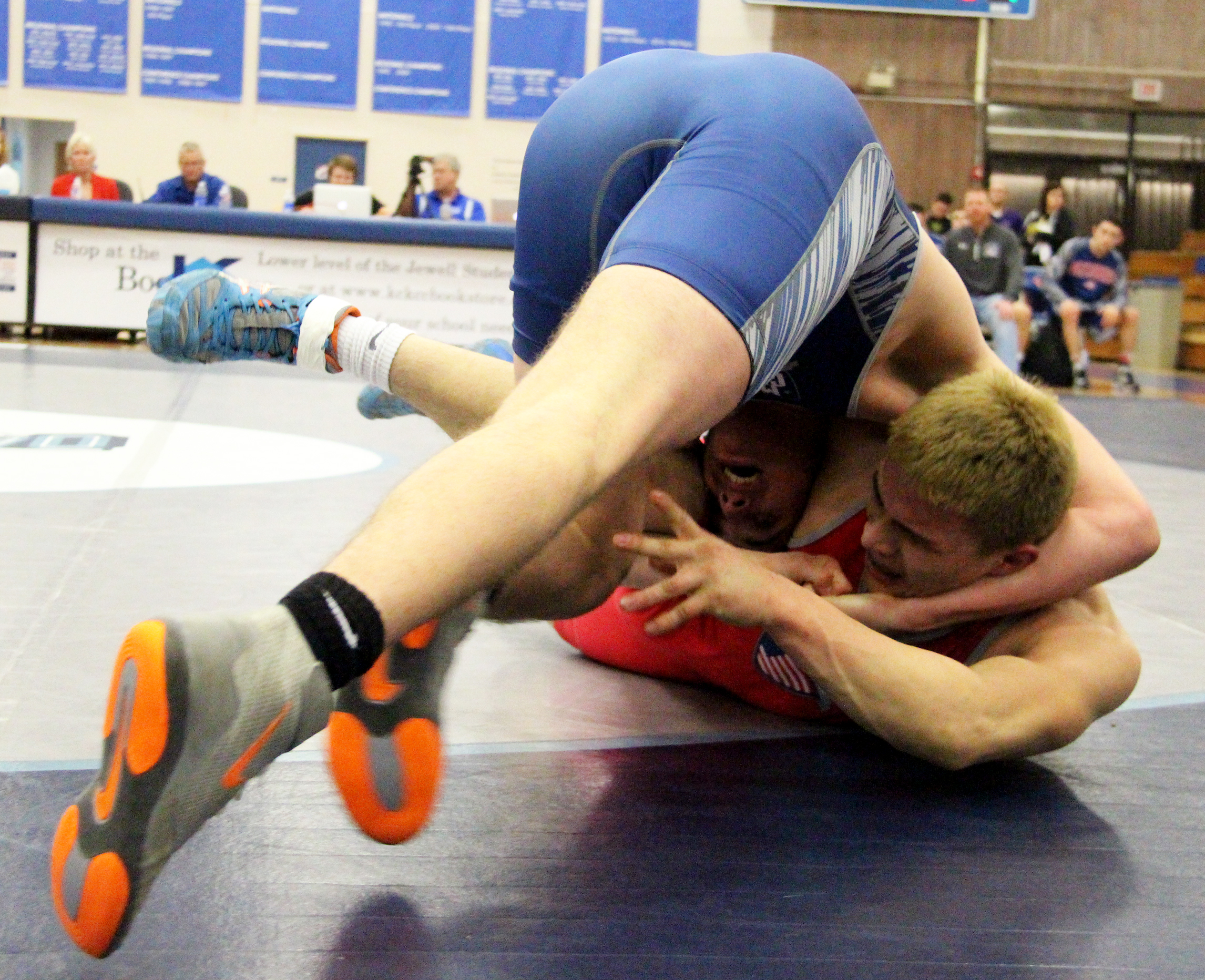 ROSS MARTIN/Citizen photo Platte County senior Johnny Blankenship, front, works to turn Cesar Salgado of Shawnee Mission North in a 160-pound matchup Tuesday, March 8.