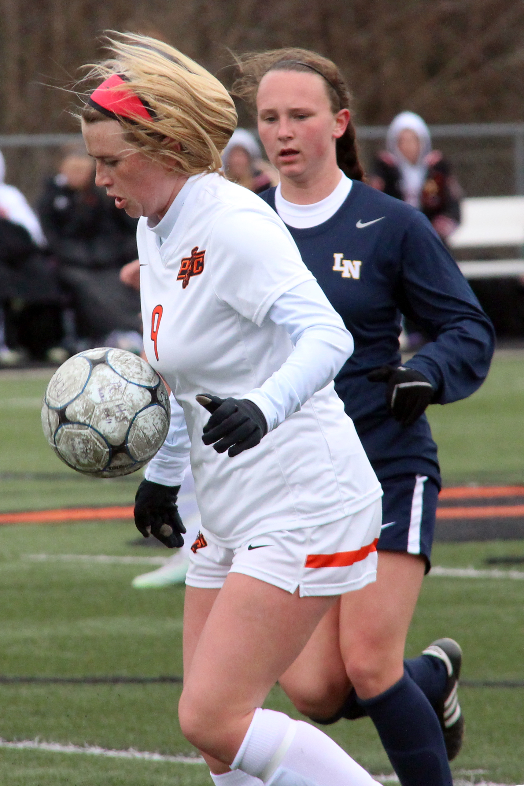 ROSS MARTIN/Citizen photo Platte County midfielder Kianna Castro, front, chests a ball down during the Platte County Invitational championship game against Liberty North on Thursday, March 24 at Pirate Stadium.