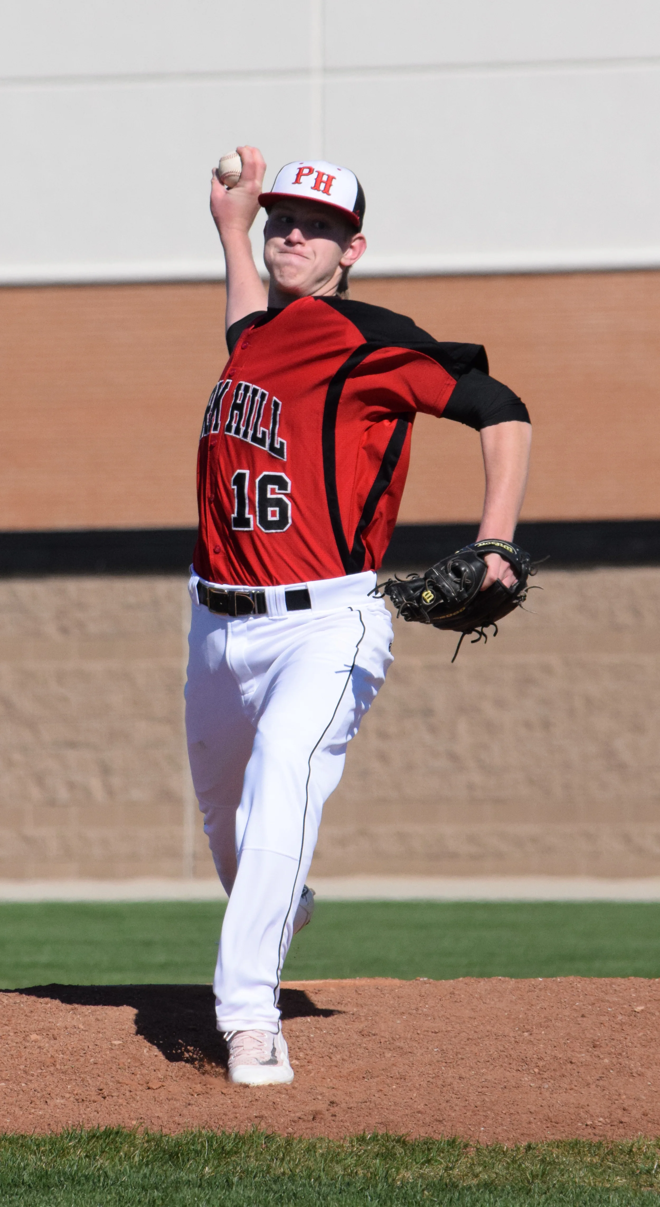 BRYCE MERENESS/Citizen photo Park Hill senior Chris Bolte delivers a pitch in the opening game of a doubleheader on Saturday, April 2 at Park Hill High School in Kansas City, Mo. 