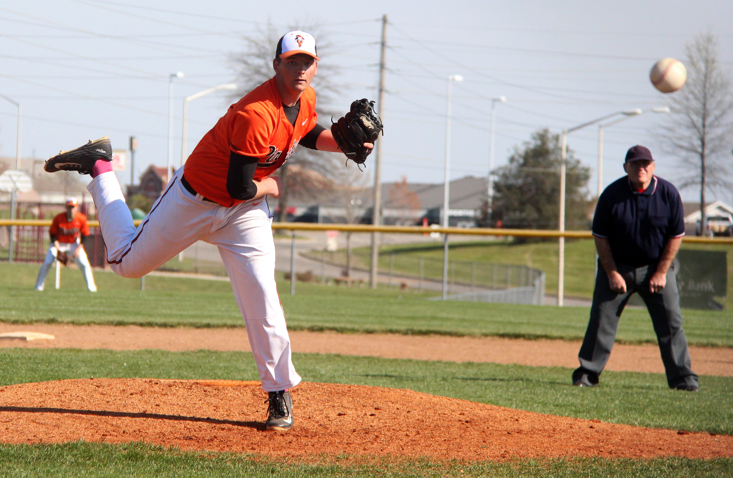 ROSS MARTIN/Citizen photo Platte County junior Grant Carver follows through on a pitch against Park Hill on Wednesday, April 13 at Platte County High School. 