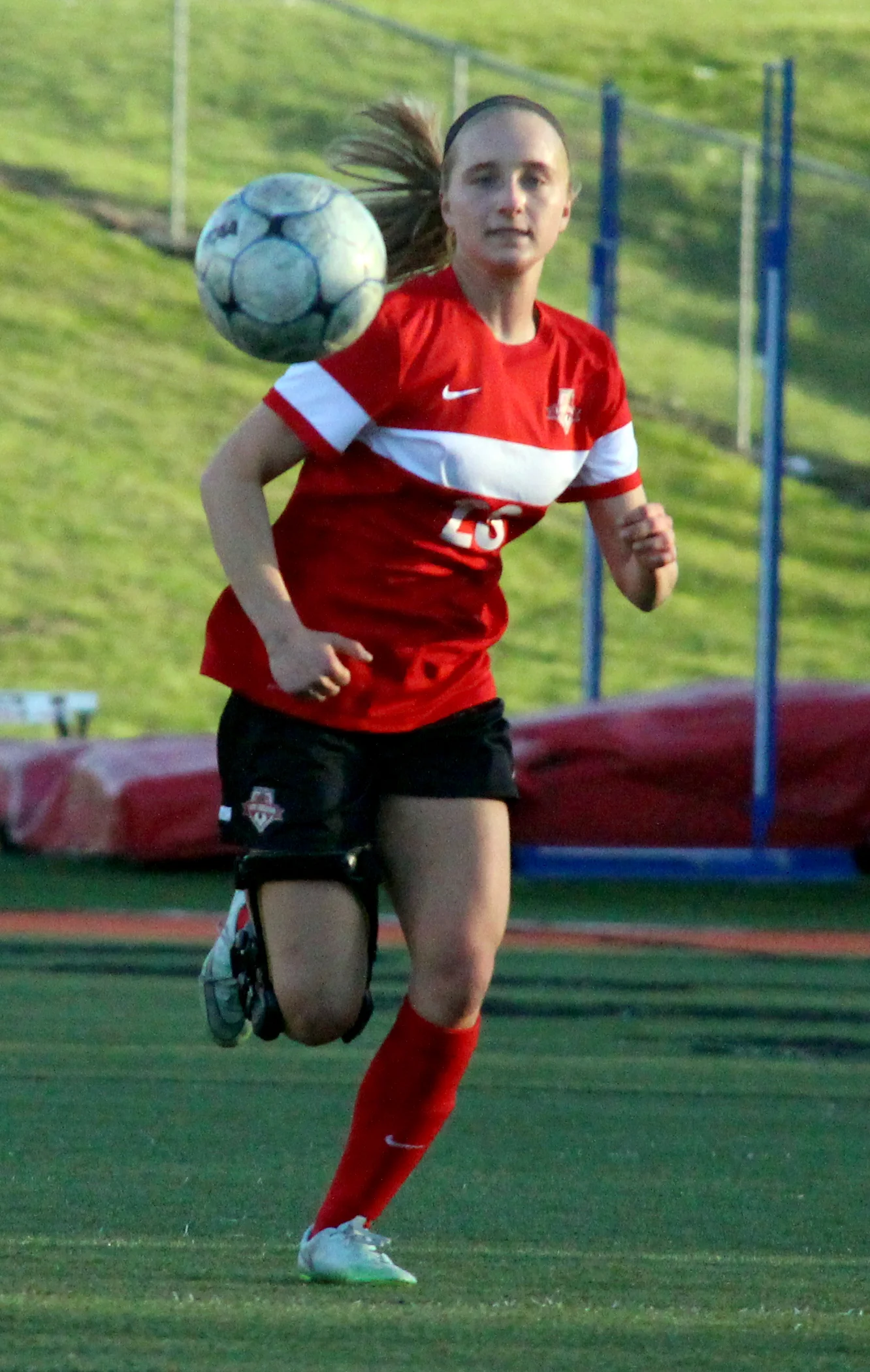ROSS MARTIN/Citizen photo Park Hill striker Alison Walls chases down a loose ball against Platte County on Wednesday, April 13 at Pirate Stadium.