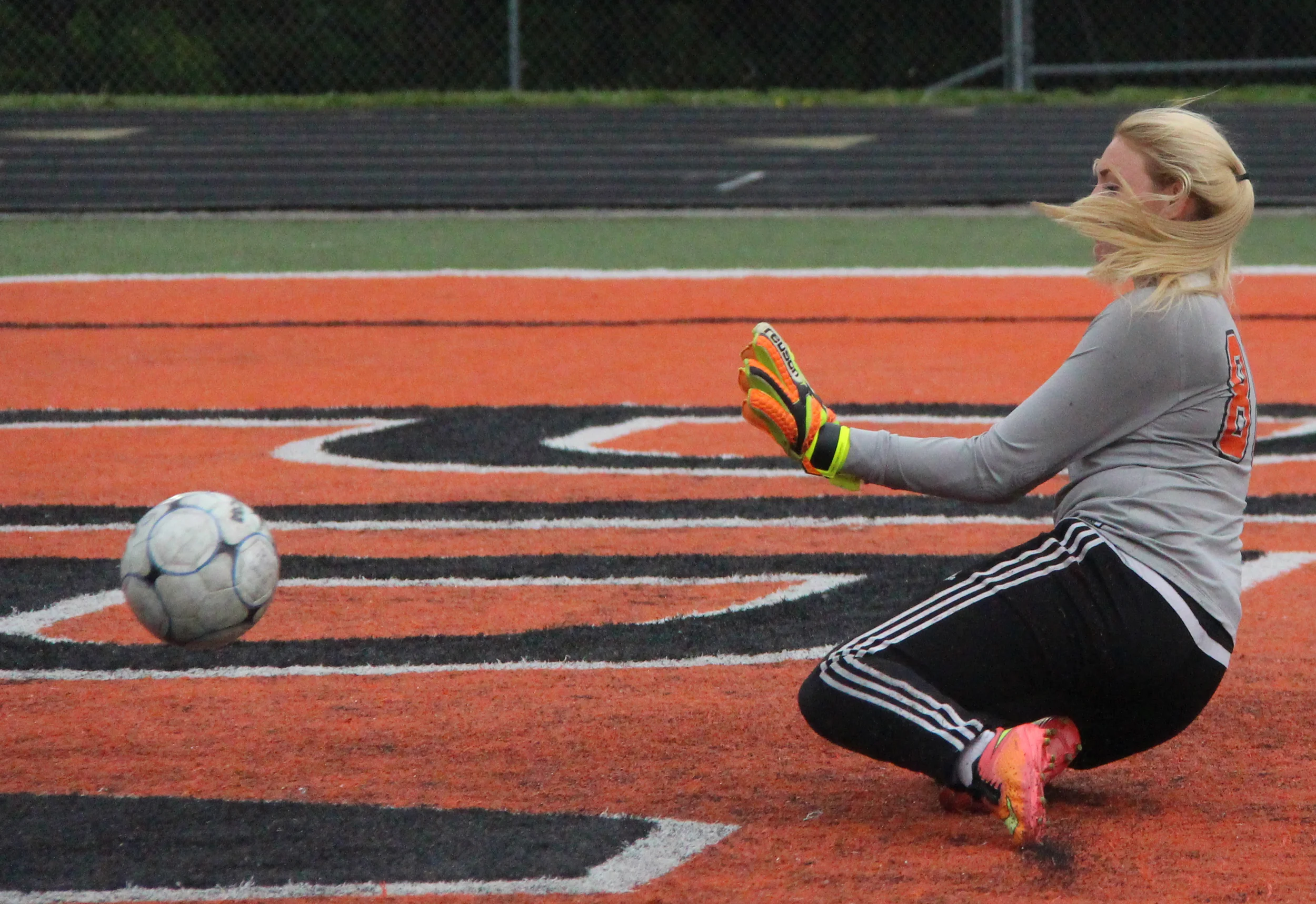 ROSS MARTIN/Citizen photo Platte County sophomore goalkeeper Faith Burtchell goes down to try and block a shot Thursday, May 19 against Smithville at Pirate Stadium.