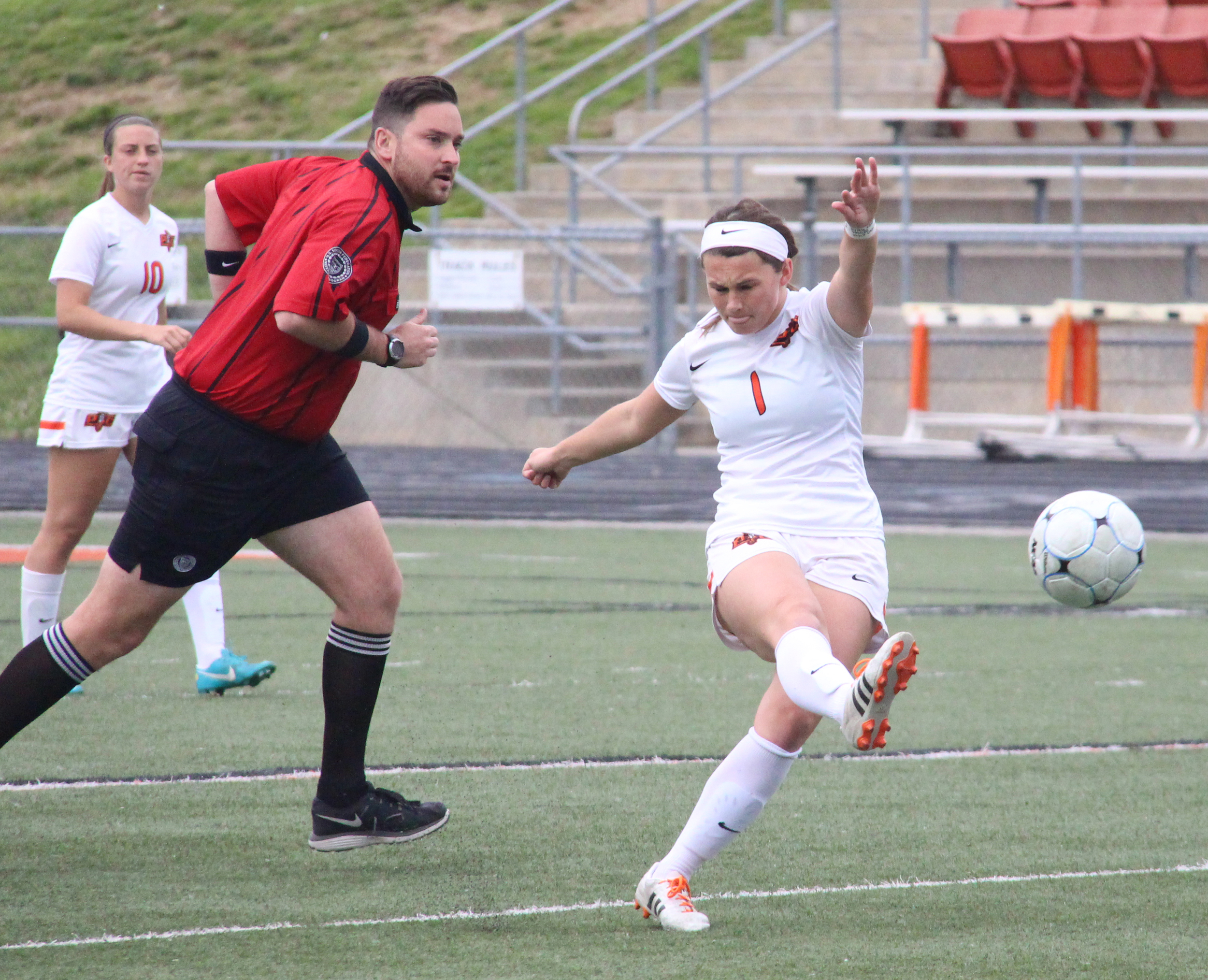 ROSS MARTIN/Citizen photo Platte County senior midfielder Brooke Zenner hits a pass during the first half of the Class 3 District 16 championship game against Smithville on Thursday, May 19 at Pirate Stadium.