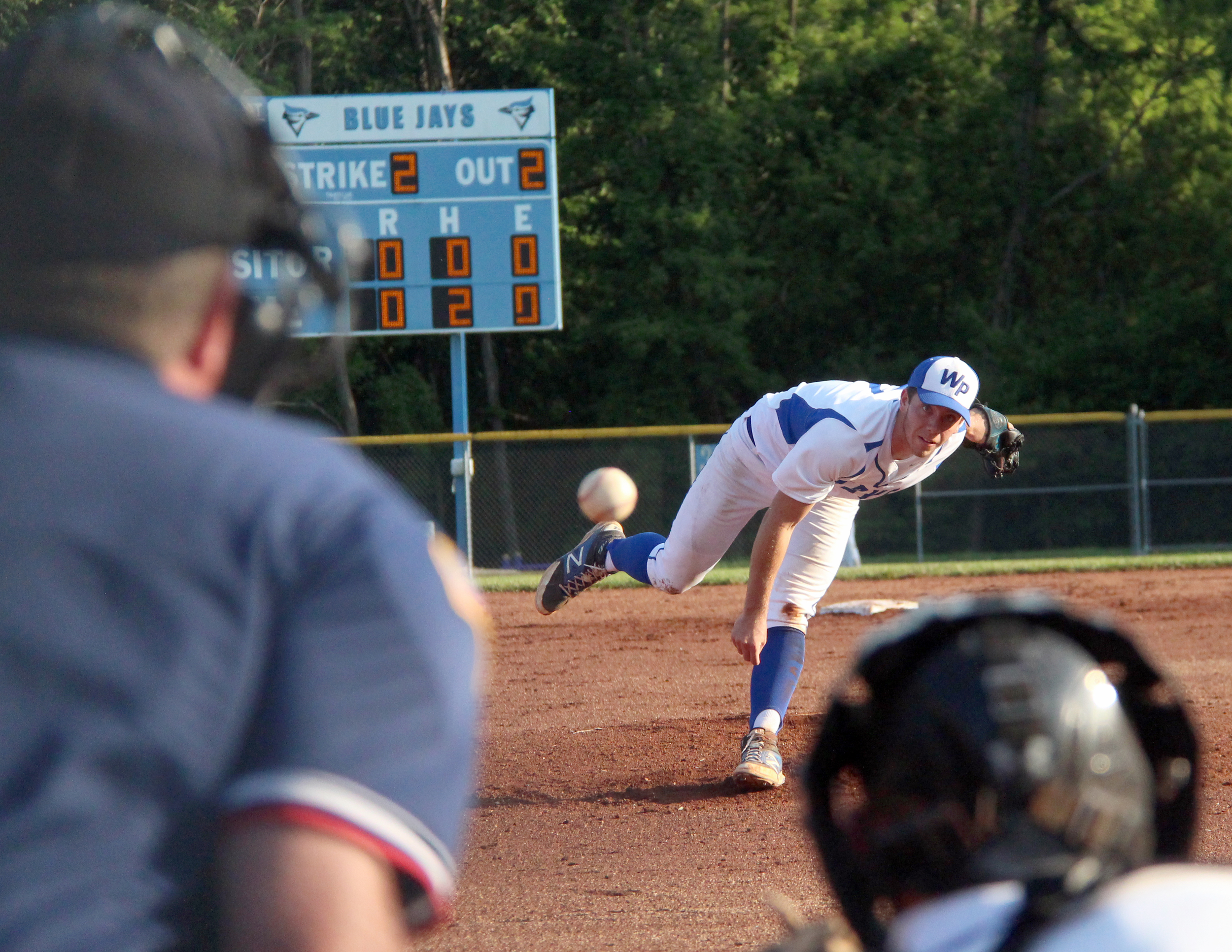 ROSS MARTIN/Citizen photo West Platte senior pitcher McKaulley Stephenson watches his delivery to catcher Peyton Morris, front right, during a Class 2 sectional matchup with Lincoln on Wednesday, May 25 at Benner Park in Weston, Mo.