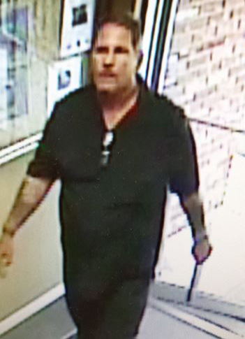 Contributed photo Security camera footage of the male suspect taken Monday at Platte Valley Bank.