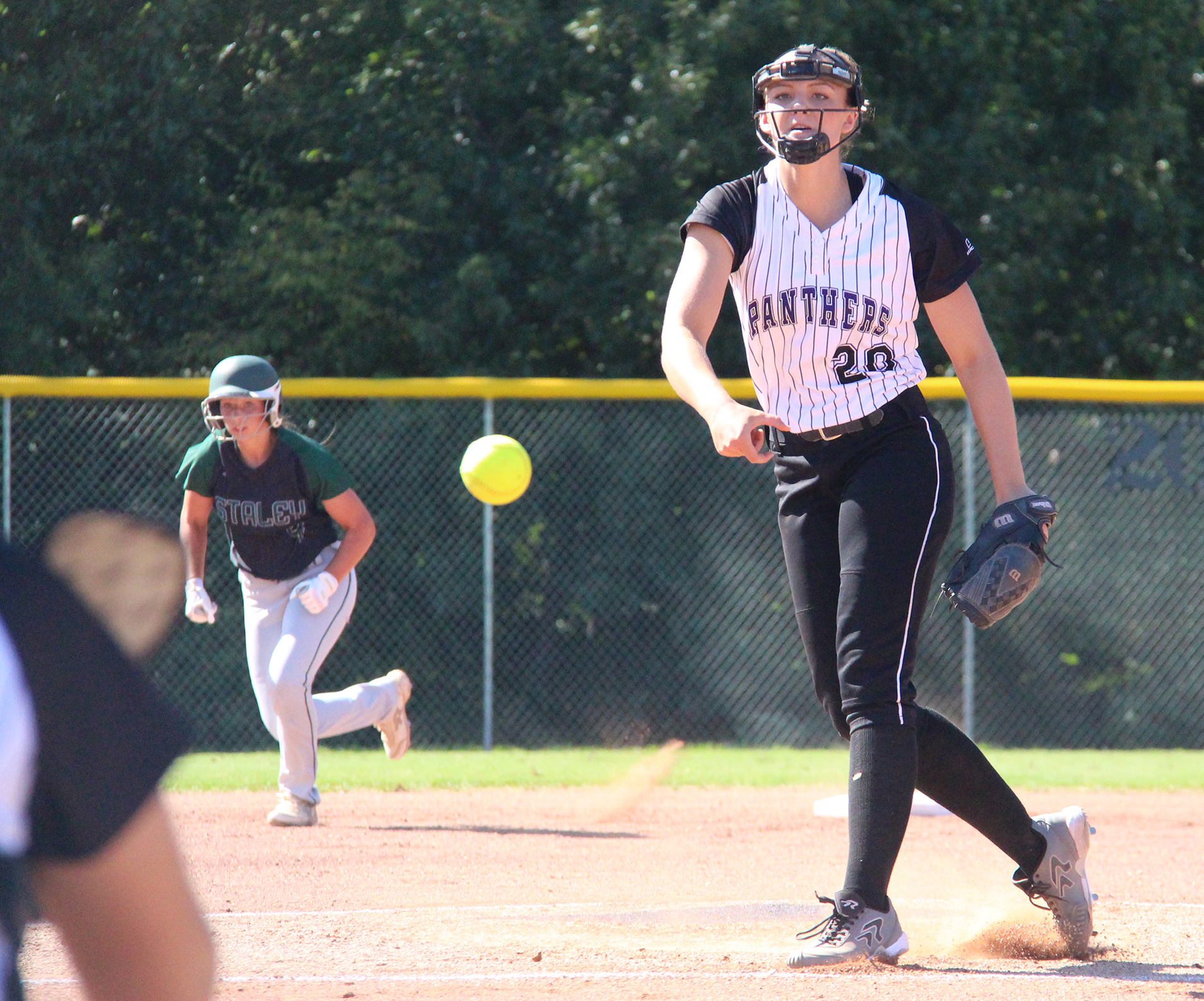 ROSS MARTIN/Citizen photo Park Hill South senior pitcher Olivia Kinsey delivers a pitch against Staley on Monday, Aug. 22 at Park Hill South High School in Riverside, Mo.