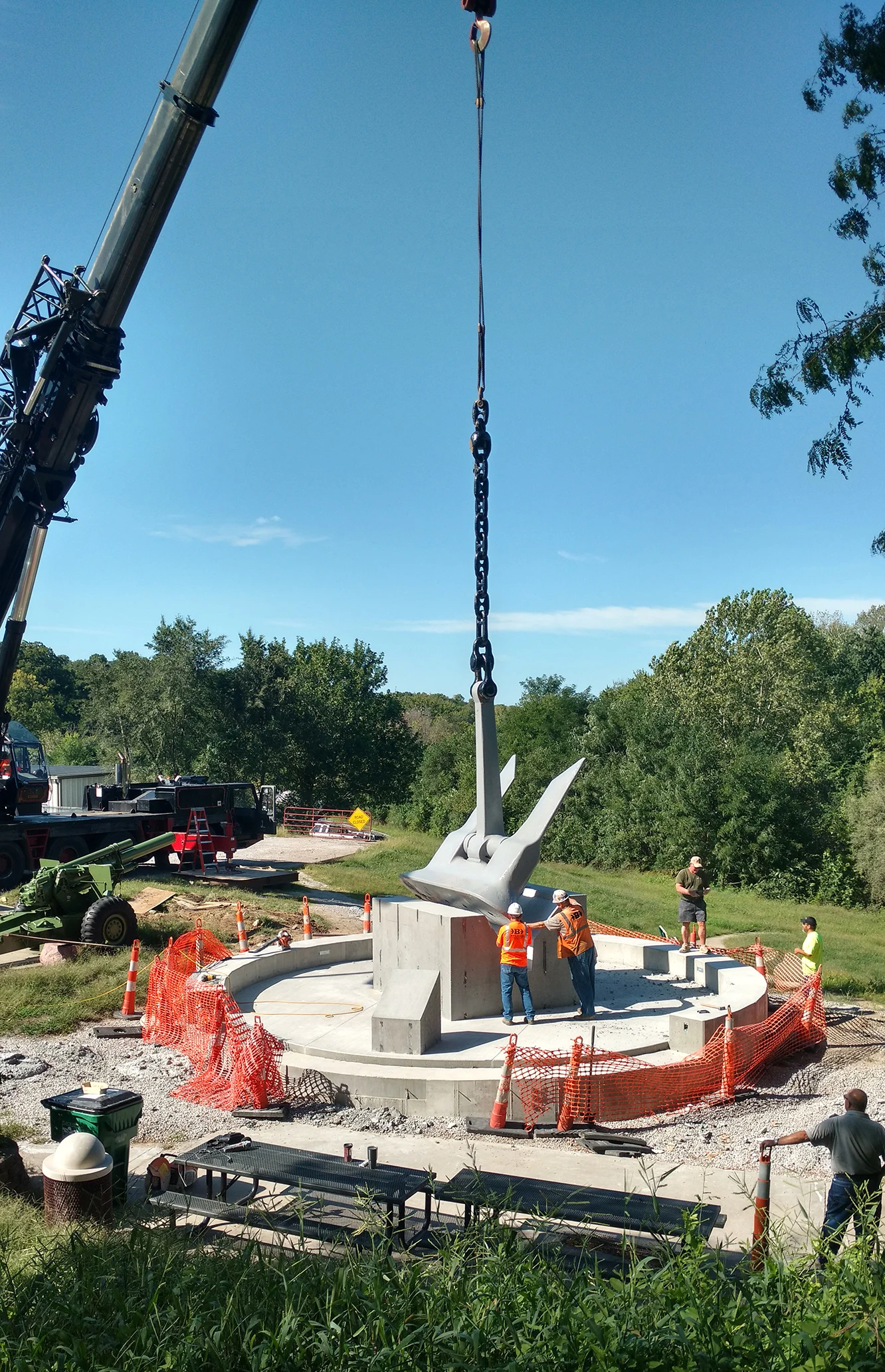 Contributed photo Workers with Belger Cartage Service and the Platte City Public Works Department set the anchor from the USS Platte into concrete Monday, Sept. 12. The anchor will be the center of a monument at Settler’s Crossing Park in Platte City.