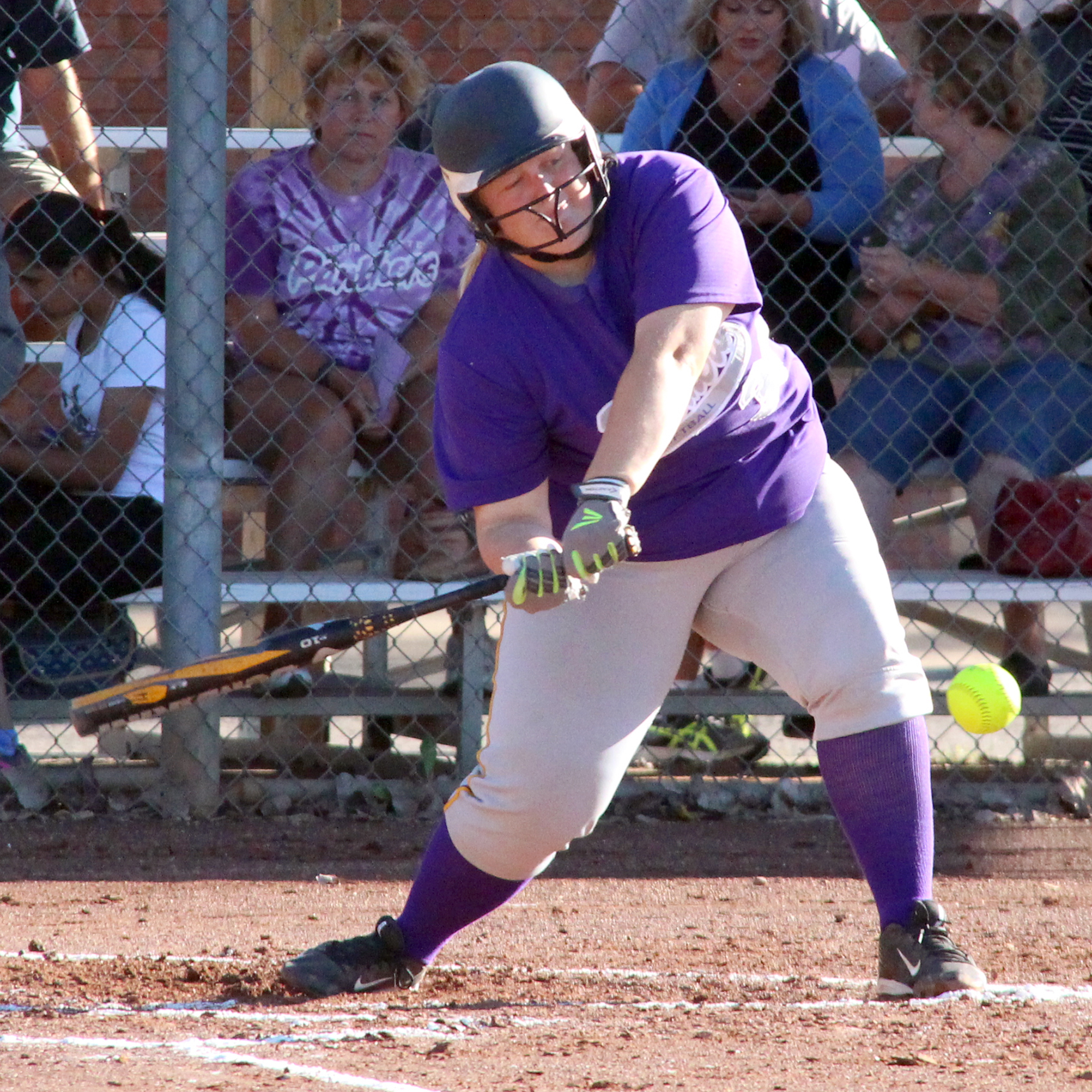 ROSS MARTIN/Citizen photo North Platte junior first baseman Miranda Daniel smacks a two-run single for the Panthers against DeKalb on Monday, Sept. 26 at Dean Park in Dearborn, Mo.
