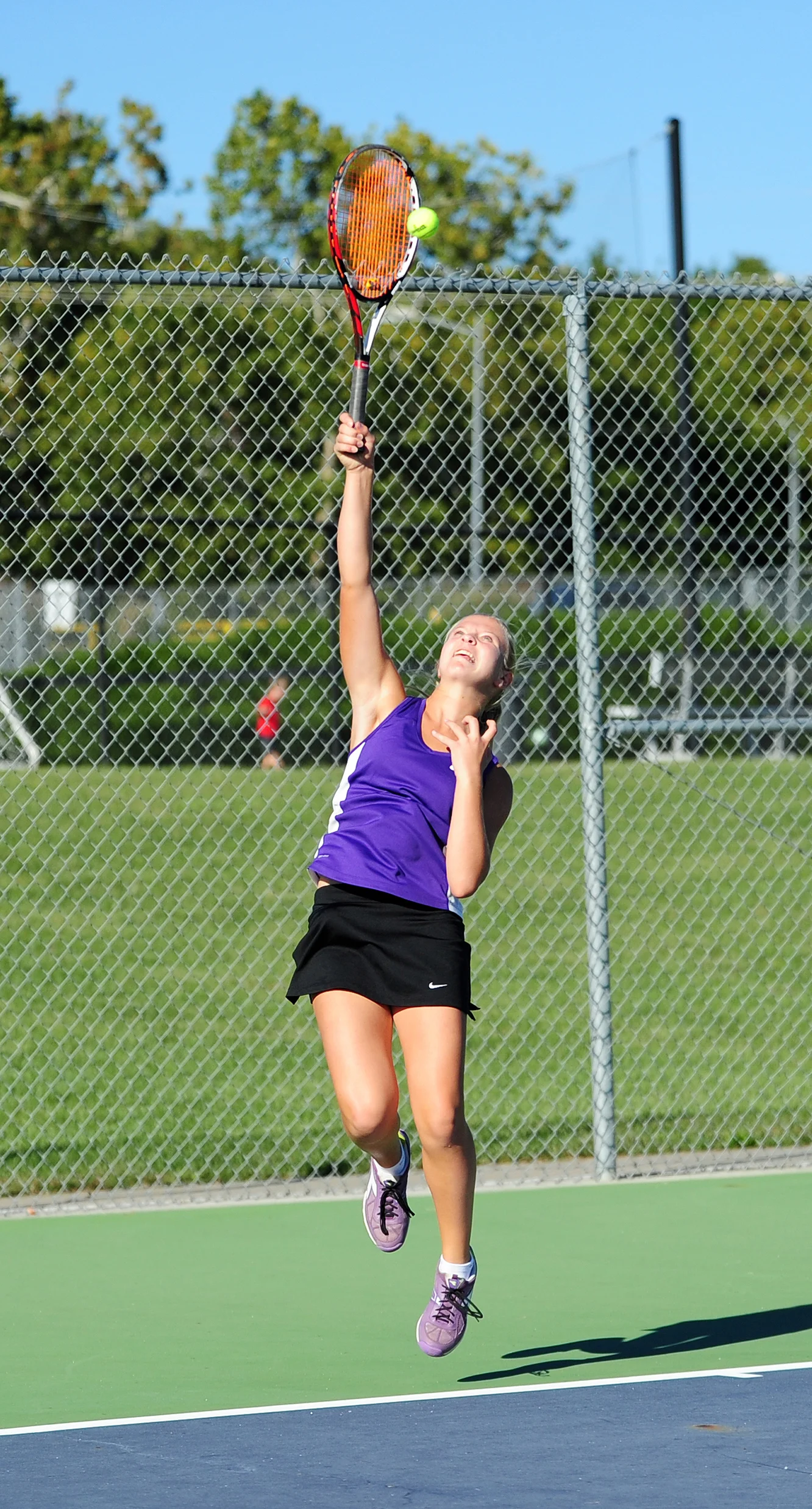 NICK INGRAM/Citizen photo Park Hill South freshman Chloe Norris hits a serve during a Class 2 District 15 semifinal dual with Park Hill on Tuesday, Sept. 27.