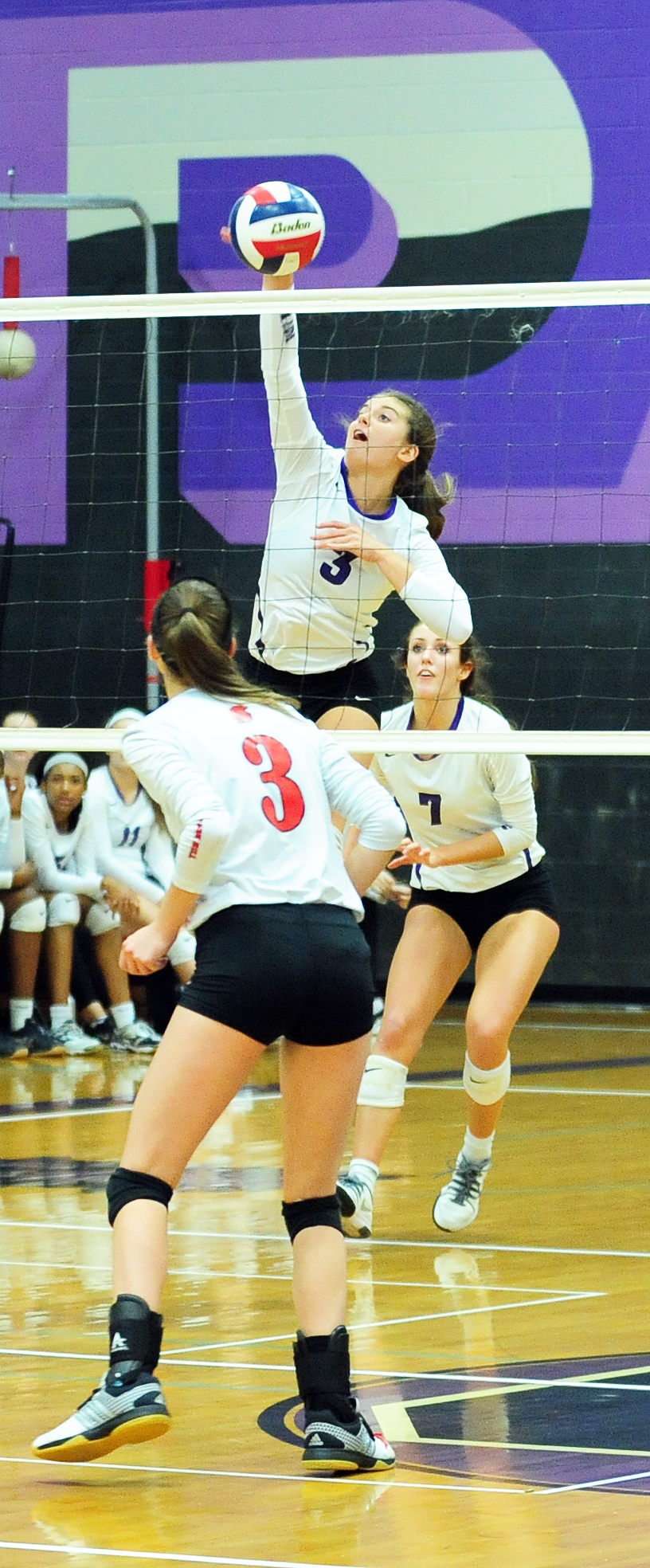 NICK INGRAM/Citizen photo Park Hill South senior Sarah Knight (3) hits a spike against Park Hill in the Class 4 District 16 championship match held Wednesday, Oct. 19 at Park Hill South High School in Riverside, Mo.
