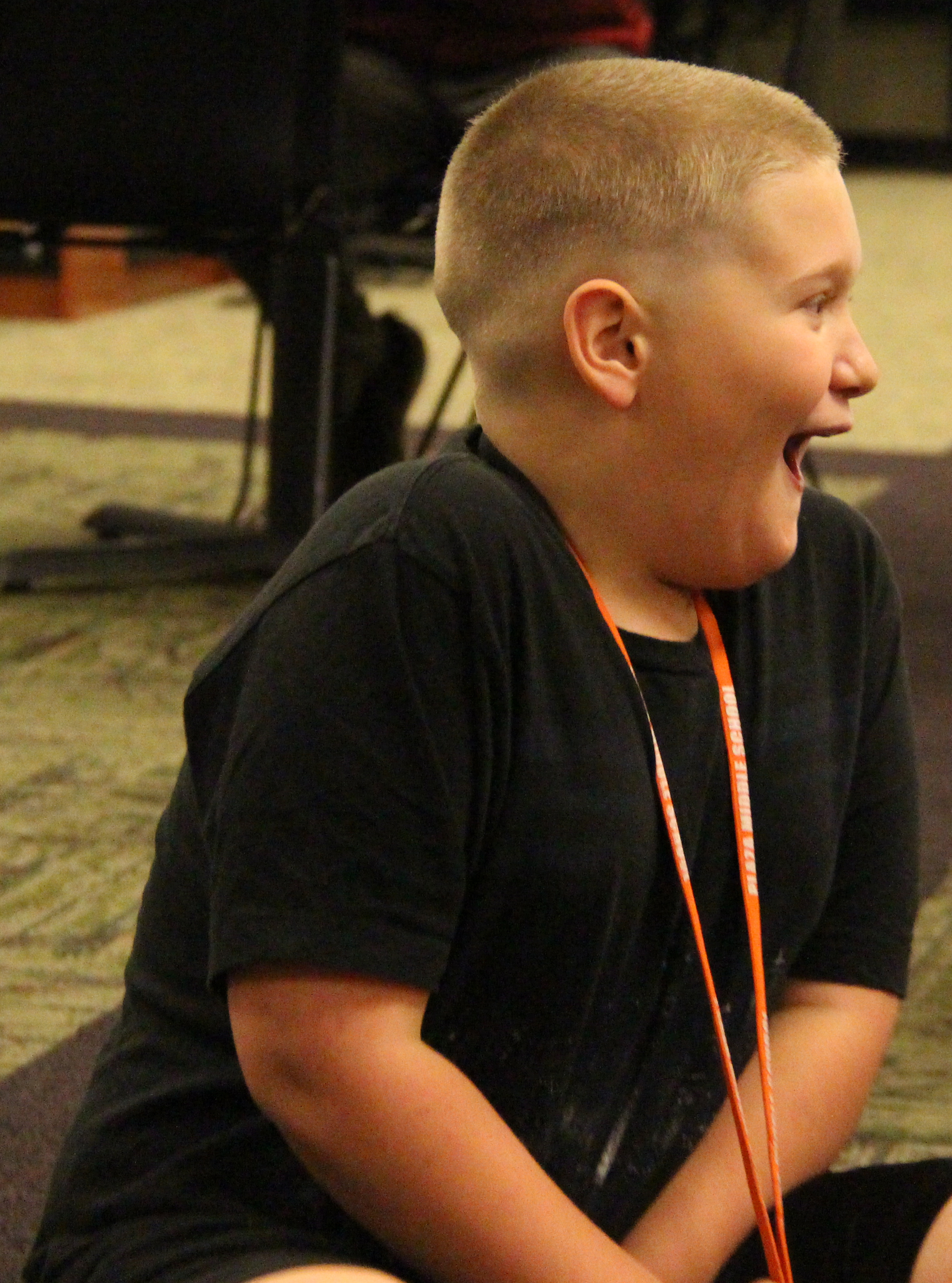 ROSS MARTIN/Citizen photo Gage Unger, 11, reacts to the news that Chiefs wide receiver Chris Conley was going to be a special guest at Plaza Middle School on Monday, Nov. 7 in Kansas City, Mo. Unbeknownst to Unger, Conley was there to make a special presentation to the sixth-grade student.
