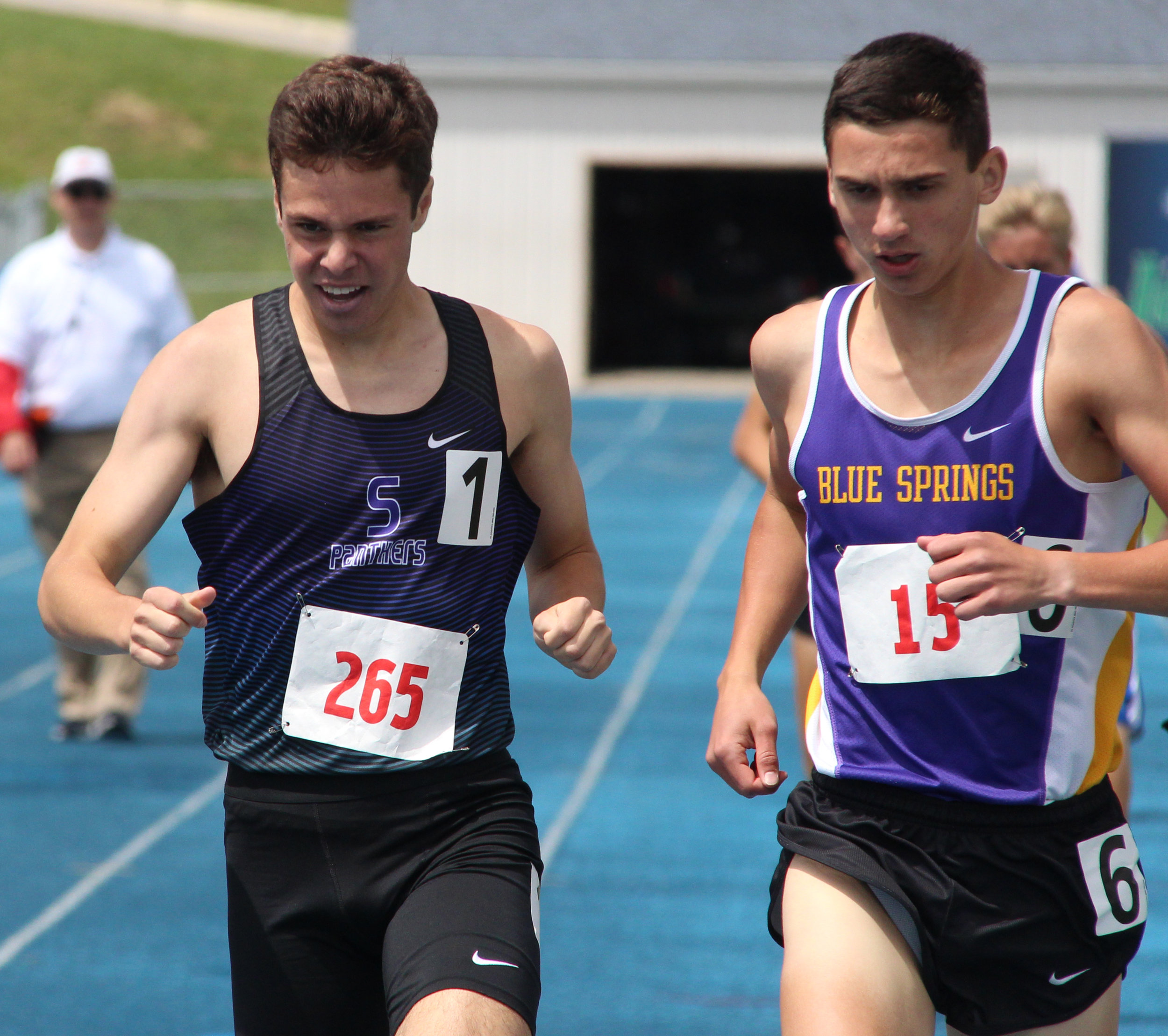 ROSS MARTIN/Citizen photo Park Hill South senior Brendan Briody leans across the finish line in the 800-meter run during the Class 5 Sectional 4 meet Saturday, May 20 in Blue Springs, Mo.