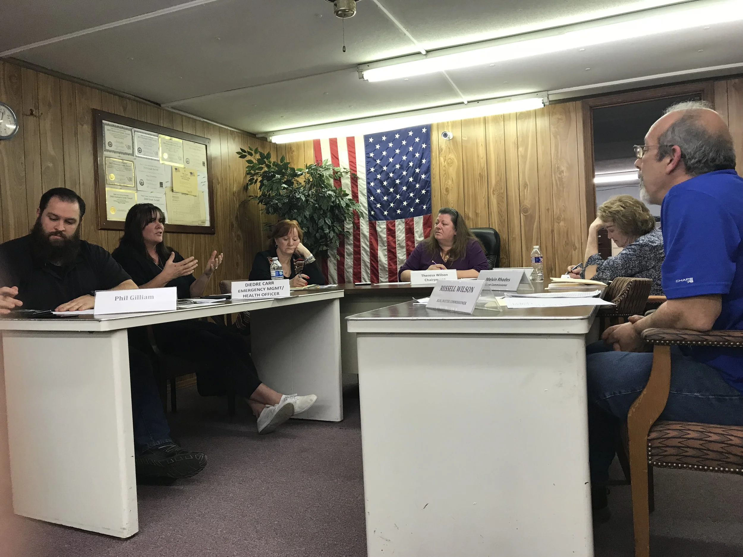 CODY THORN/Citizen photo Village of Ferrelview trustee Diedre Carr, second from left, discusses safety issues in the village during the board of trustee meeting held on Tuesday, March 13. 