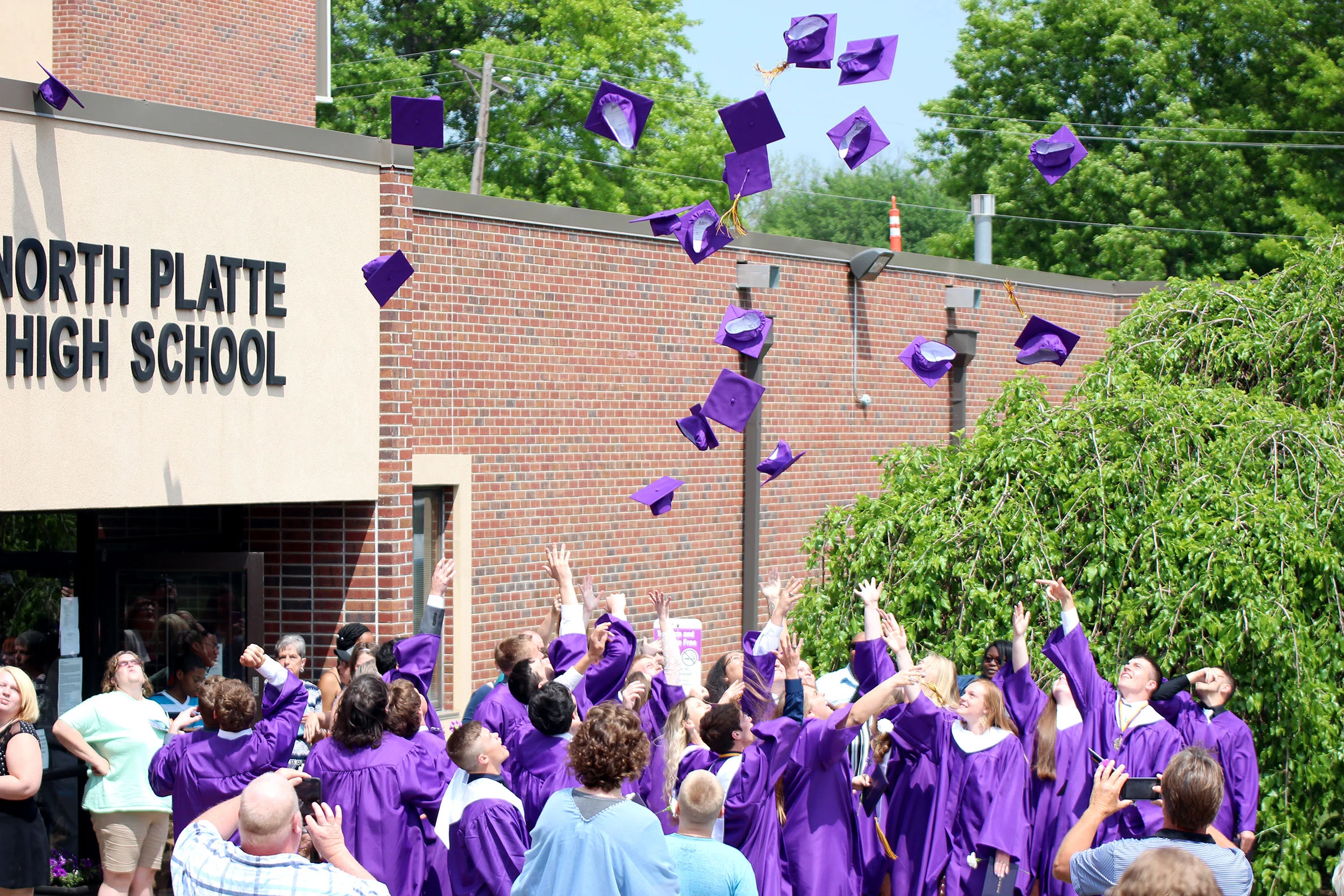 CODY THORN/Citizen photo The North Platte High School seniors throw their caps into the air following a graduation ceremony on Sunday, May 13 in Dearborn, Mo. The Class of 2018 featured 32 graduates.